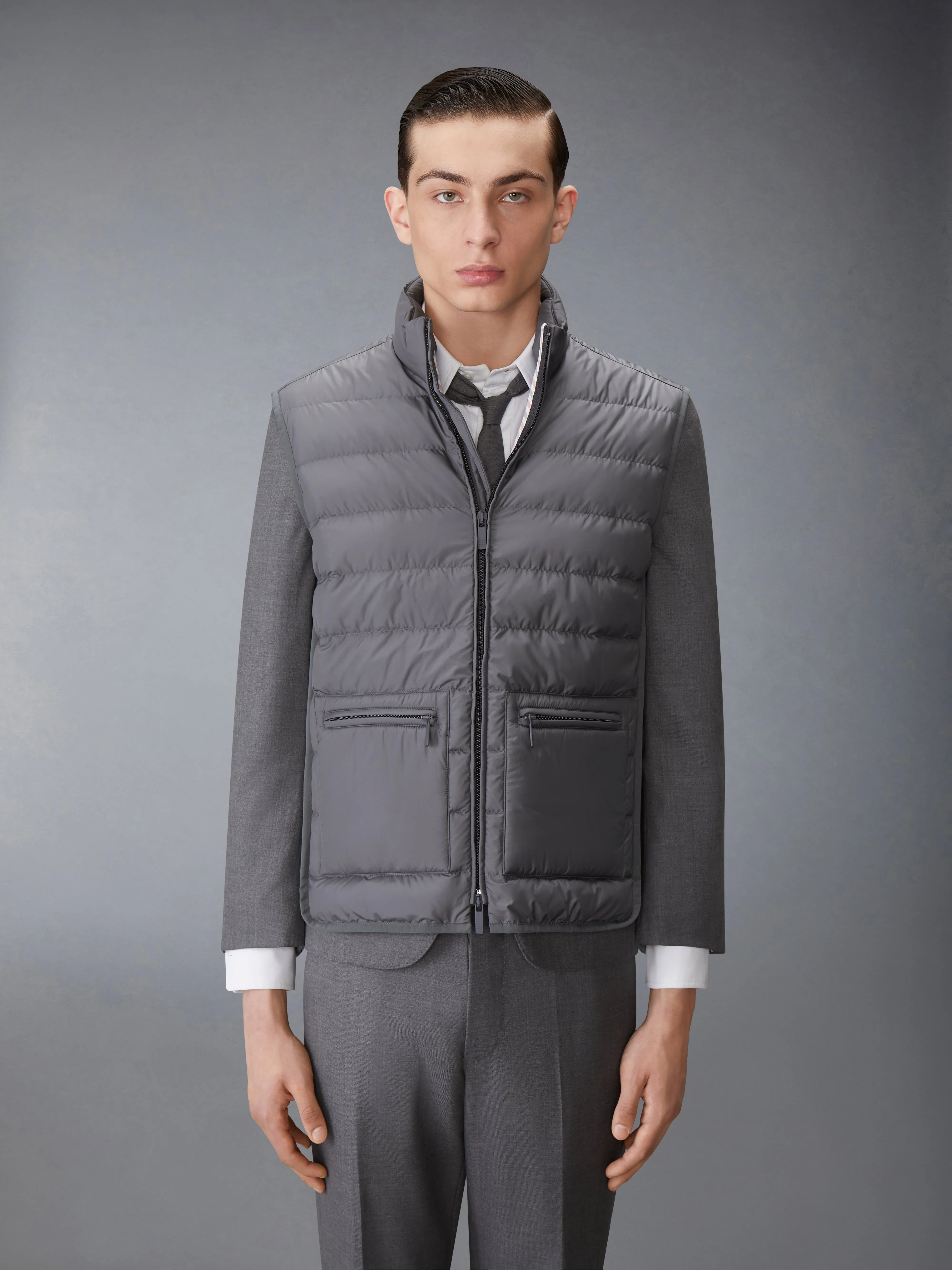 ULTRA LIGHT NYLON TECH FUNNEL NECK DOWN VEST sold by Thom Browne