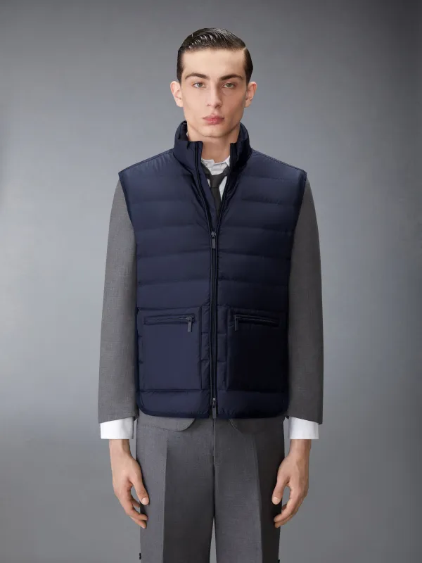 ULTRA LIGHT NYLON TECH FUNNEL NECK DOWN VEST sold by Thom Browne