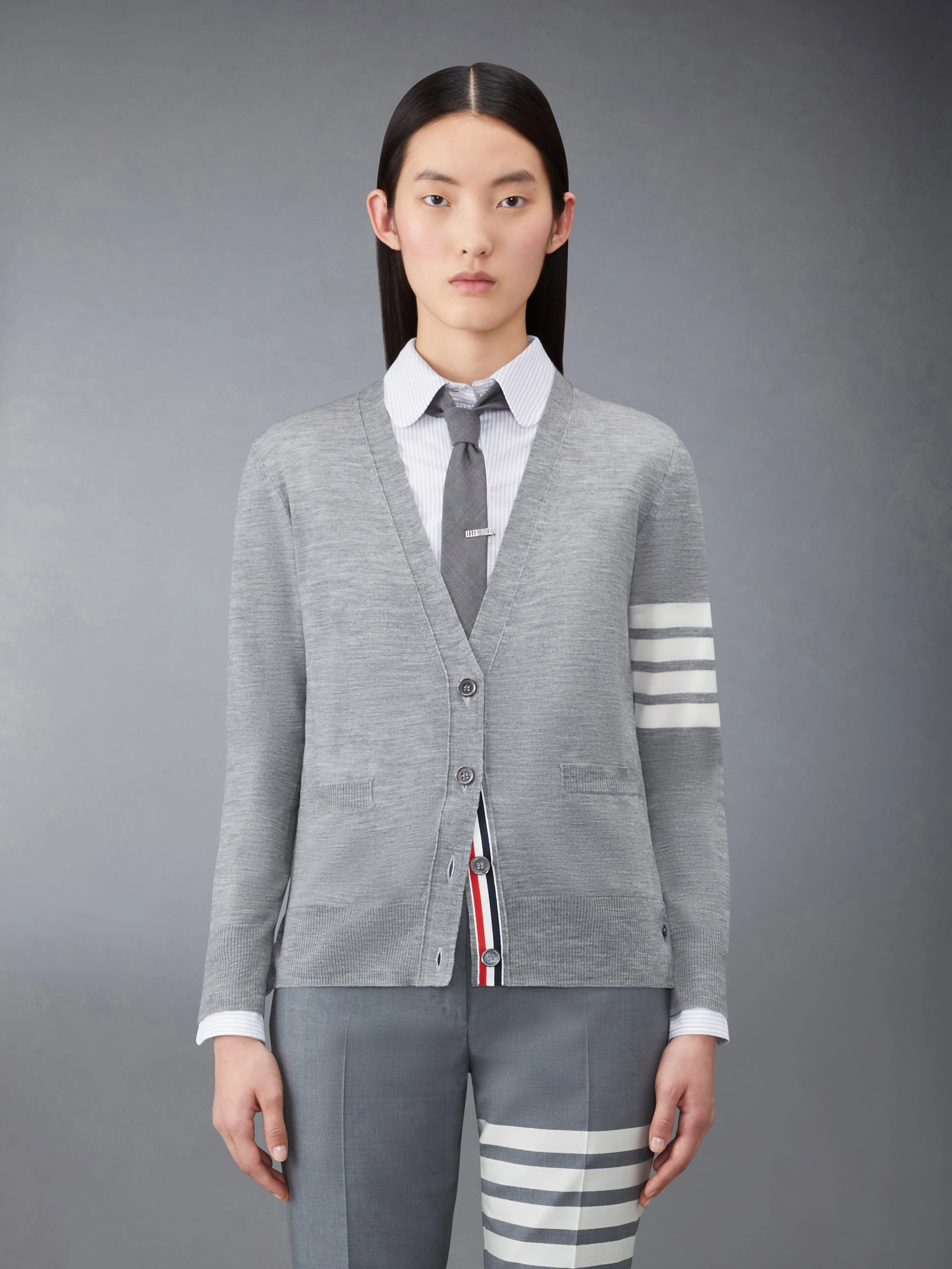 WOOL 4-BAR RELAXED V-NECK CARDIGAN sold by Thom Browne
