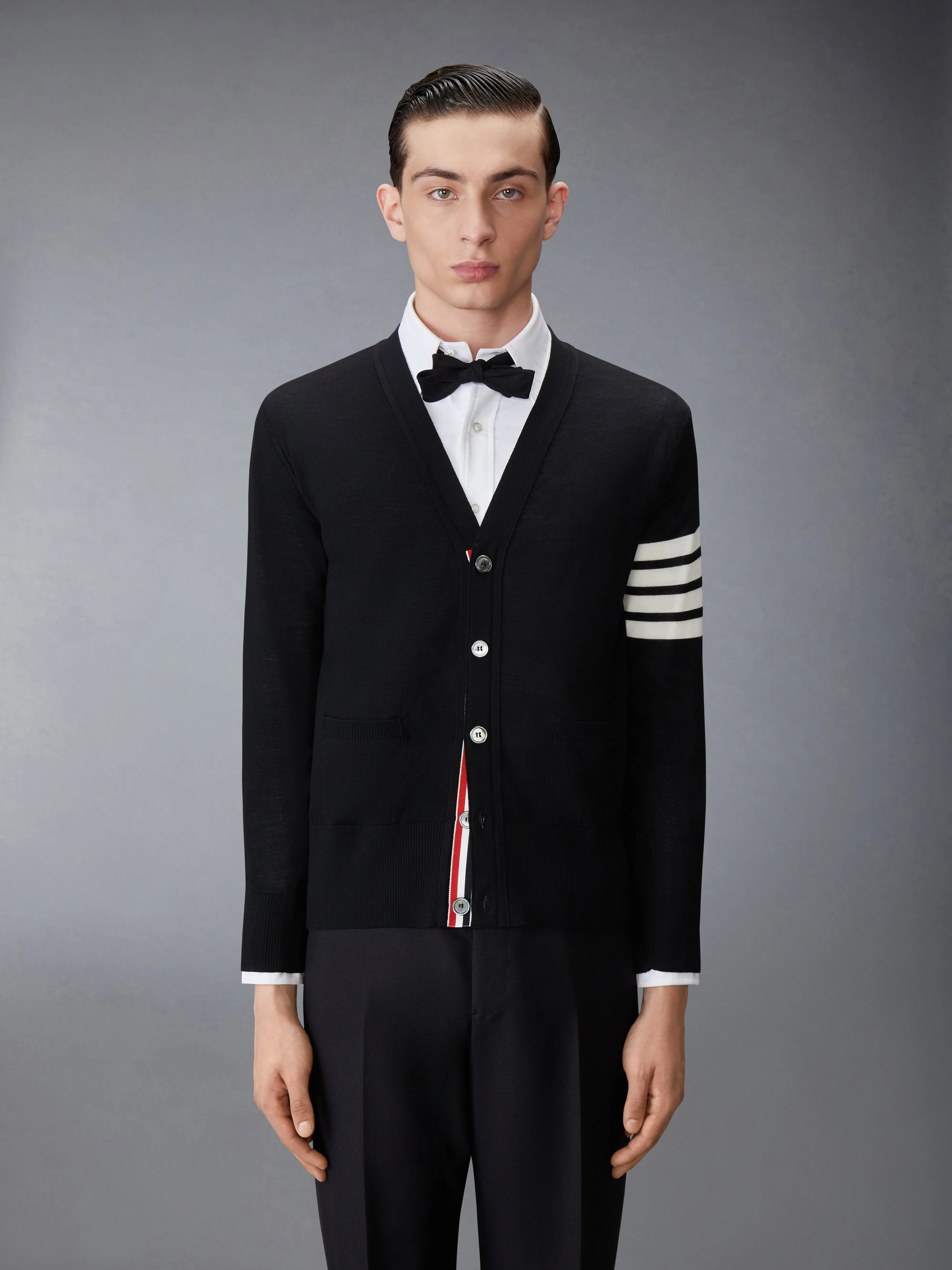 WOOL CLASSIC 4-BAR V-NECK CARDIGAN sold by Thom Browne