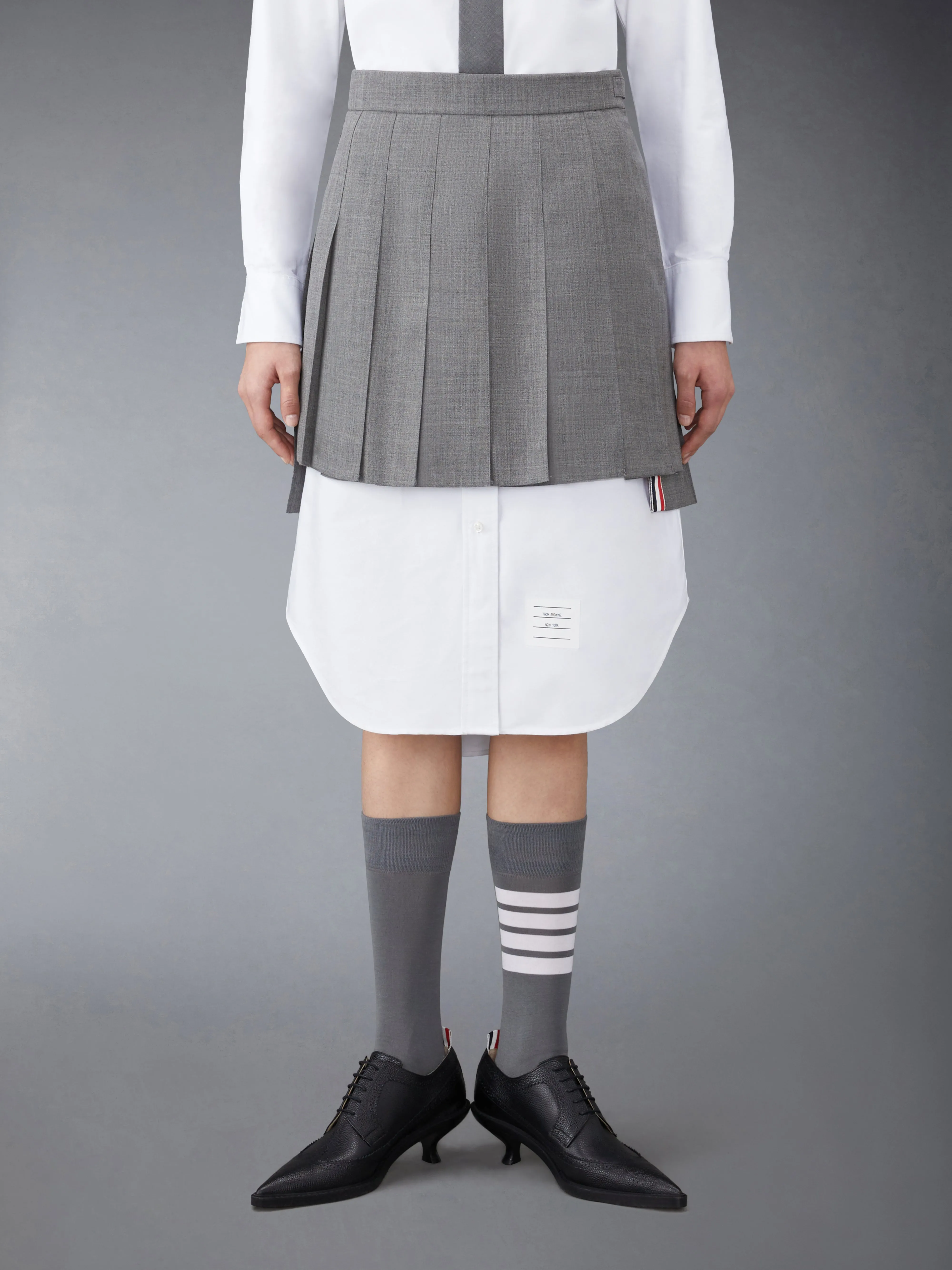 WOOL FRESCO MINI PLEATED SKIRT sold by Thom Browne