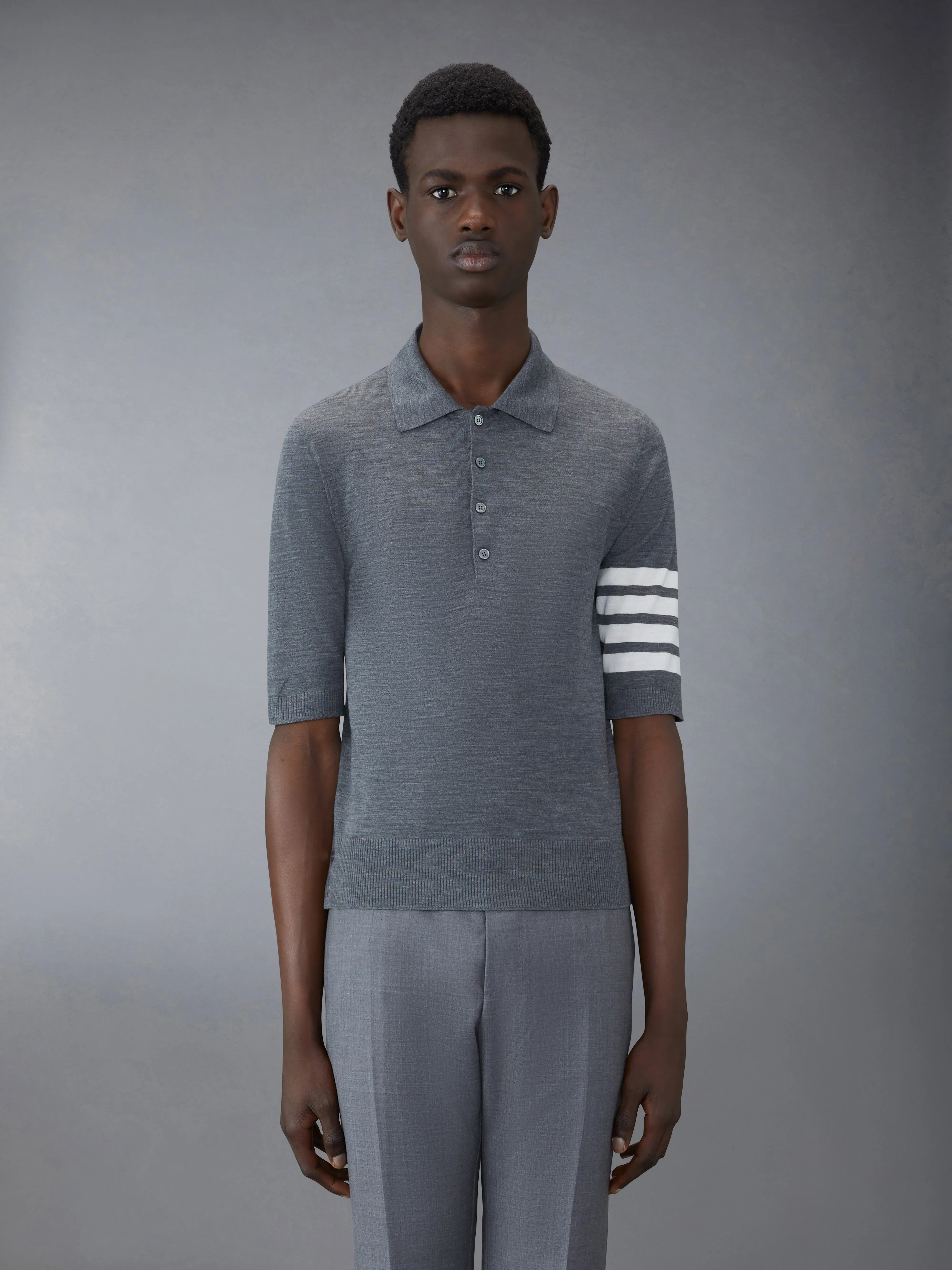FINE MERINO WOOL POLO sold by Thom Browne