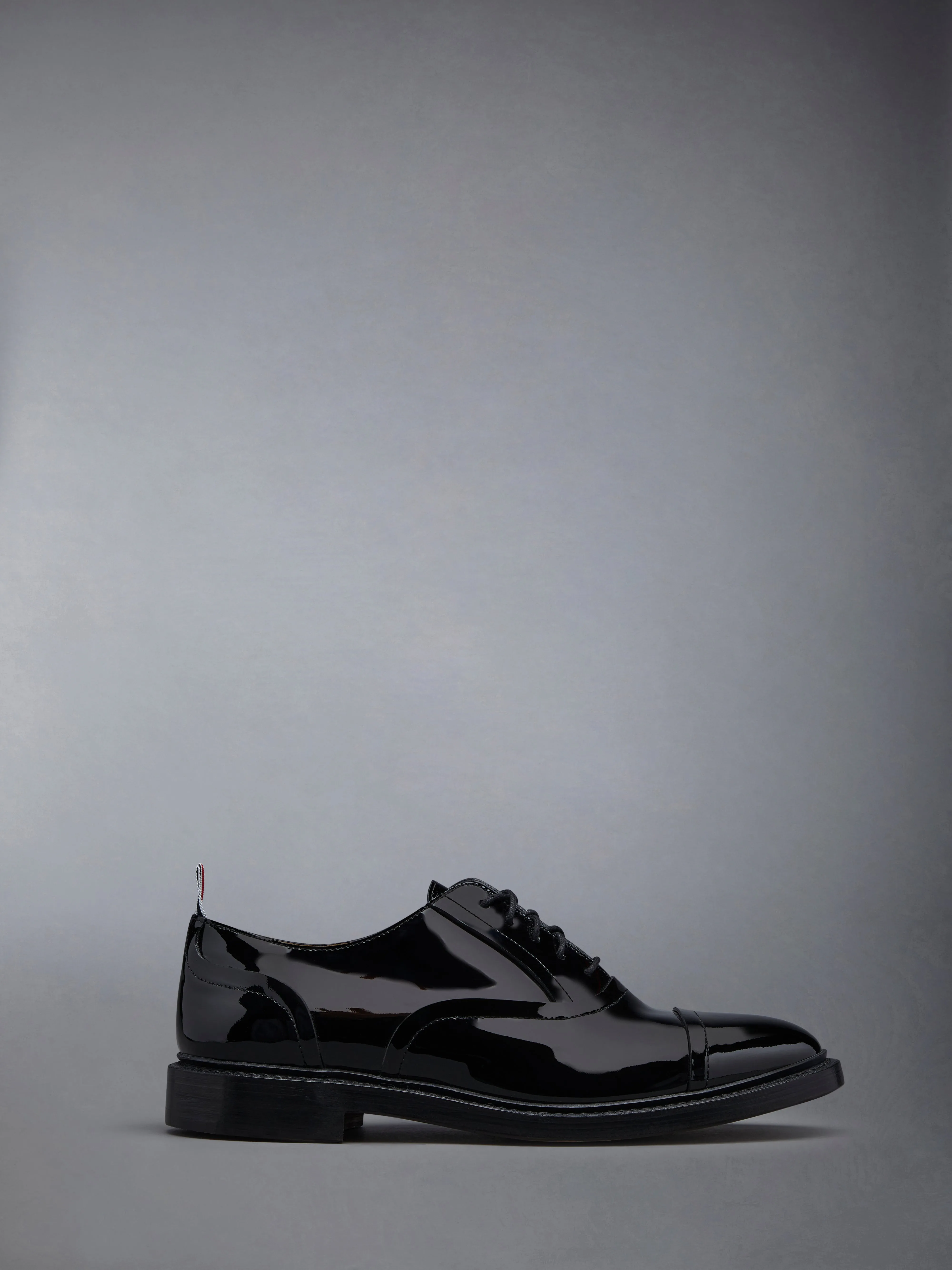 Soft Patent Raw Edge Goodyear Sole Cap Toe Oxford sold by Thom Browne