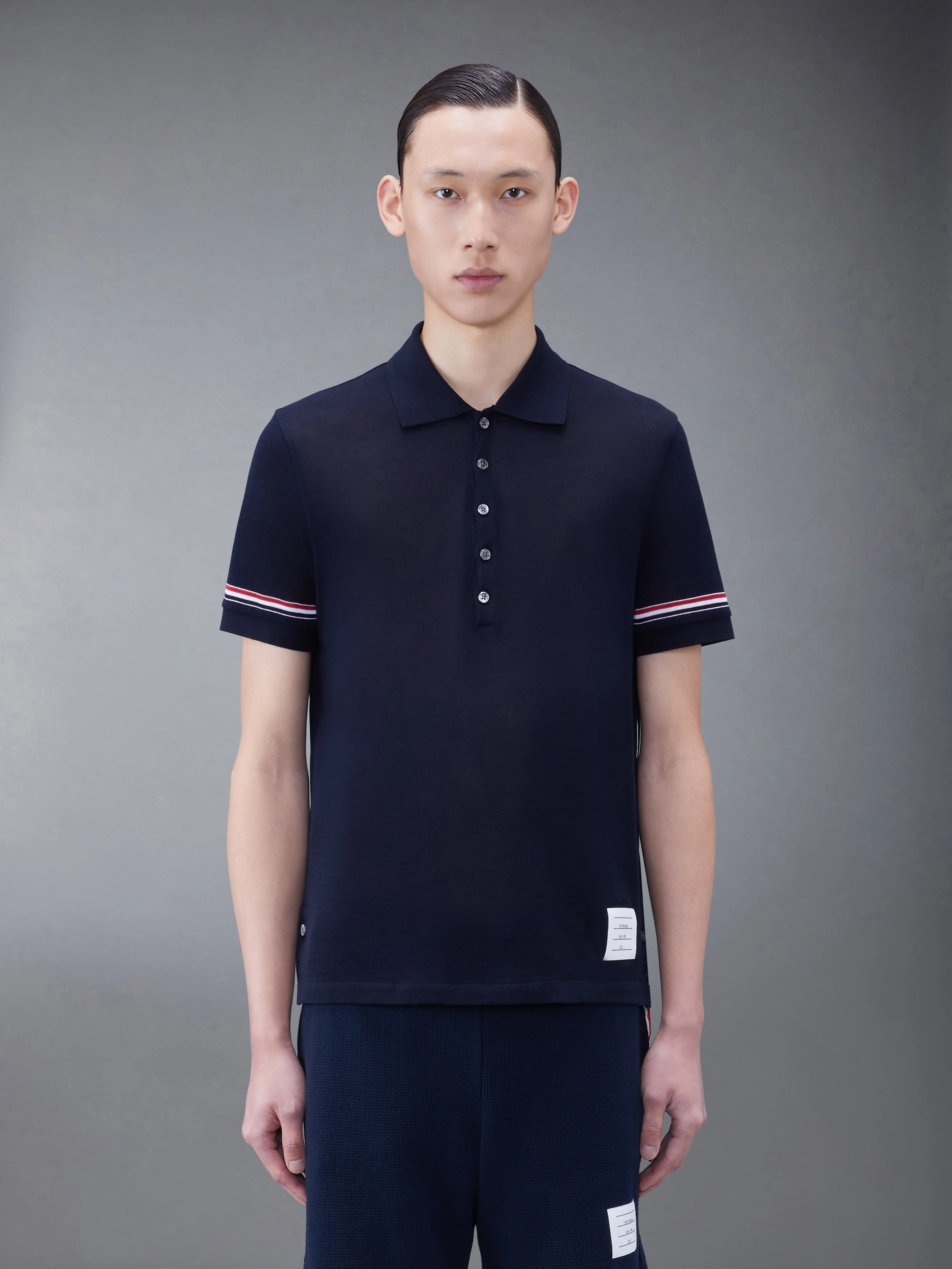 LIGHTWEIGHT COTTON SHORT SLEEVE POLO sold by Thom Browne