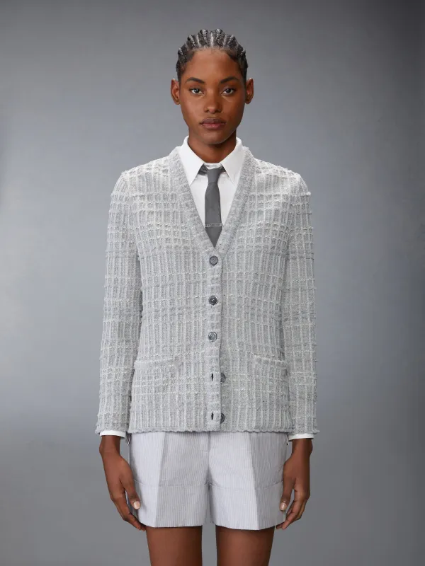 SEERSUCKER KNIT TWEED JACQUARD V NECK CARDIGAN sold by Thom Browne