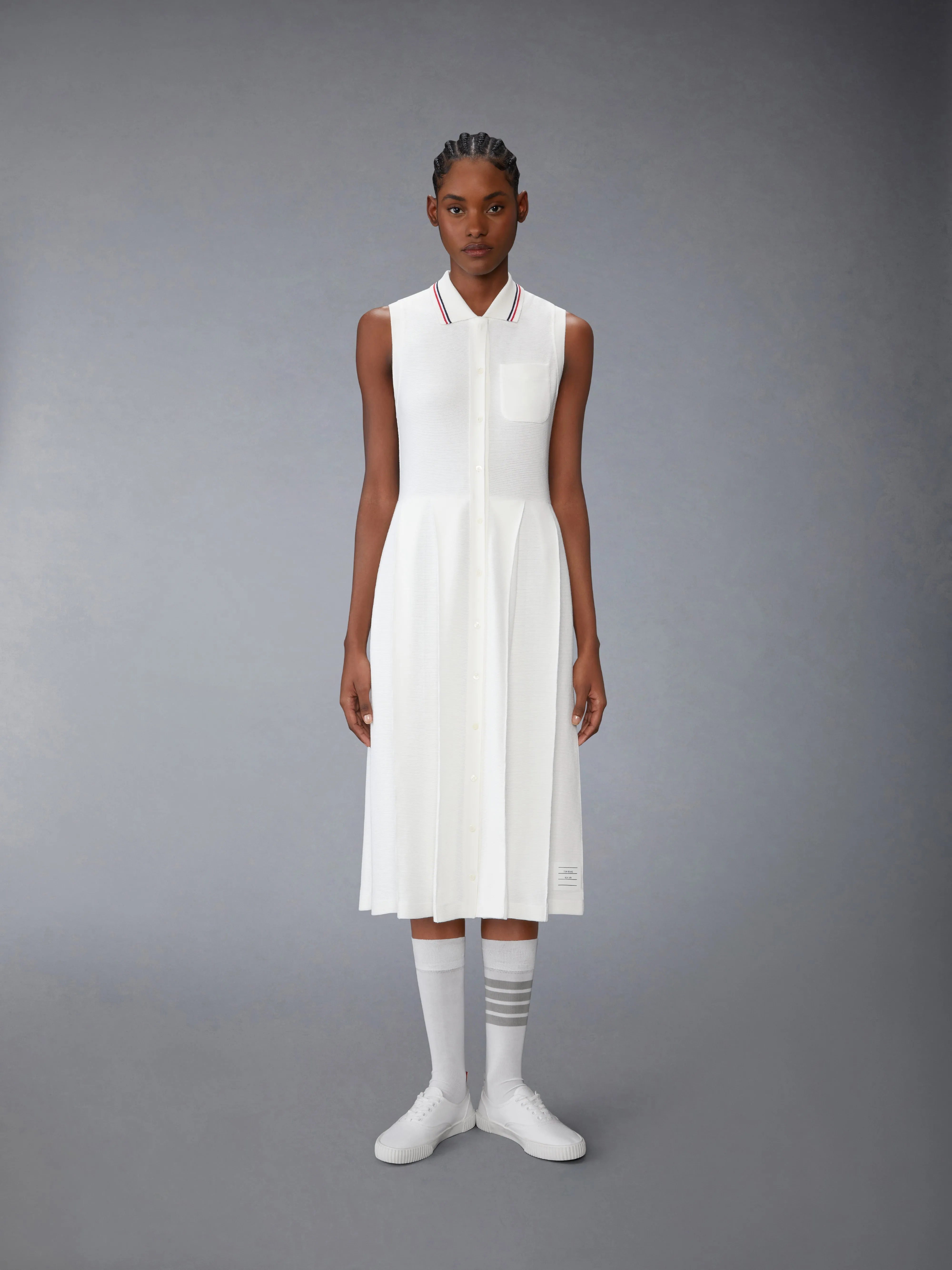 COTTON WAFFLE PLEATED POLO DRESS sold by Thom Browne