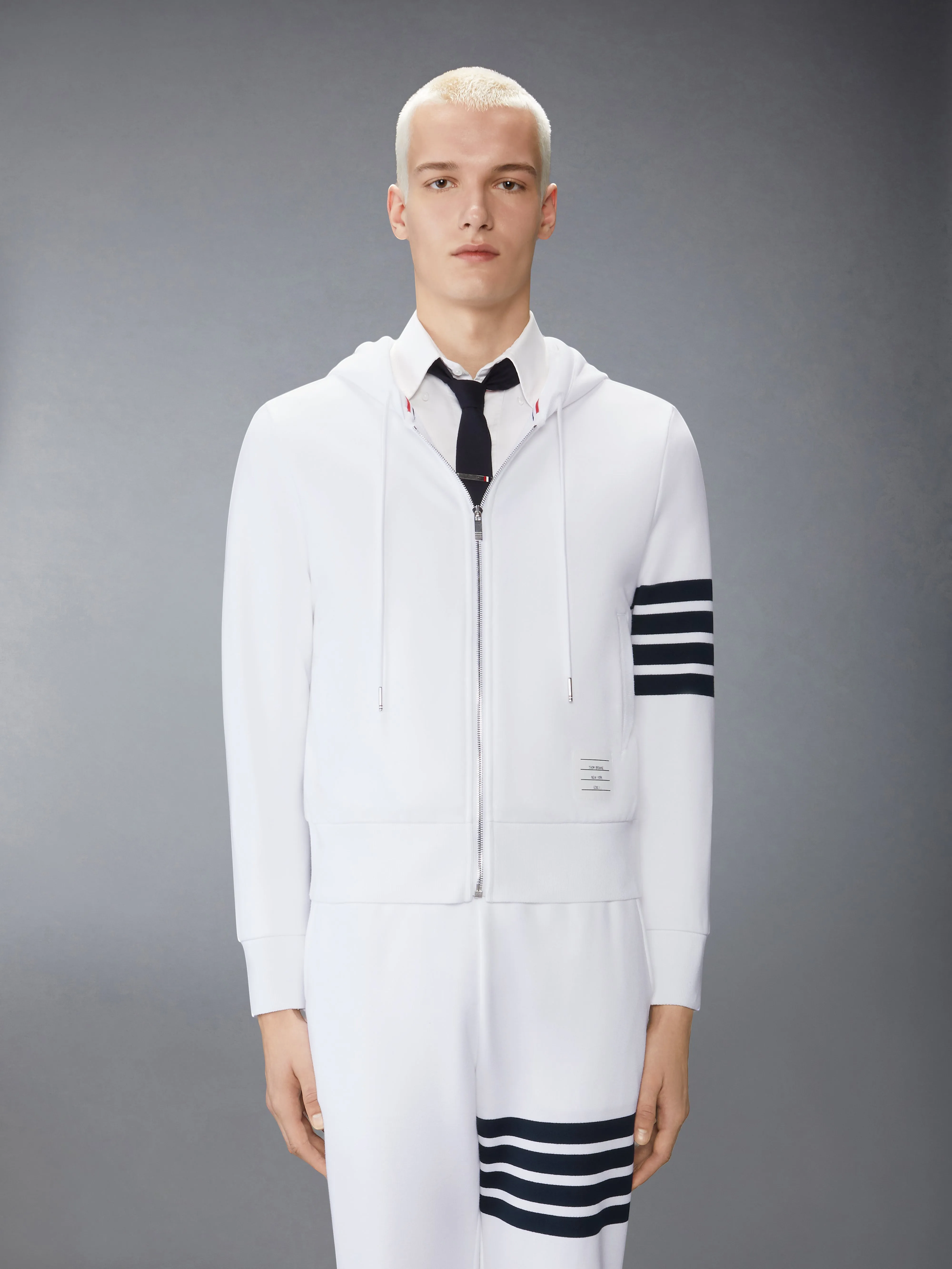 CLASSIC LOOPBACK 4-BAR ZIP UP HOODIE sold by Thom Browne