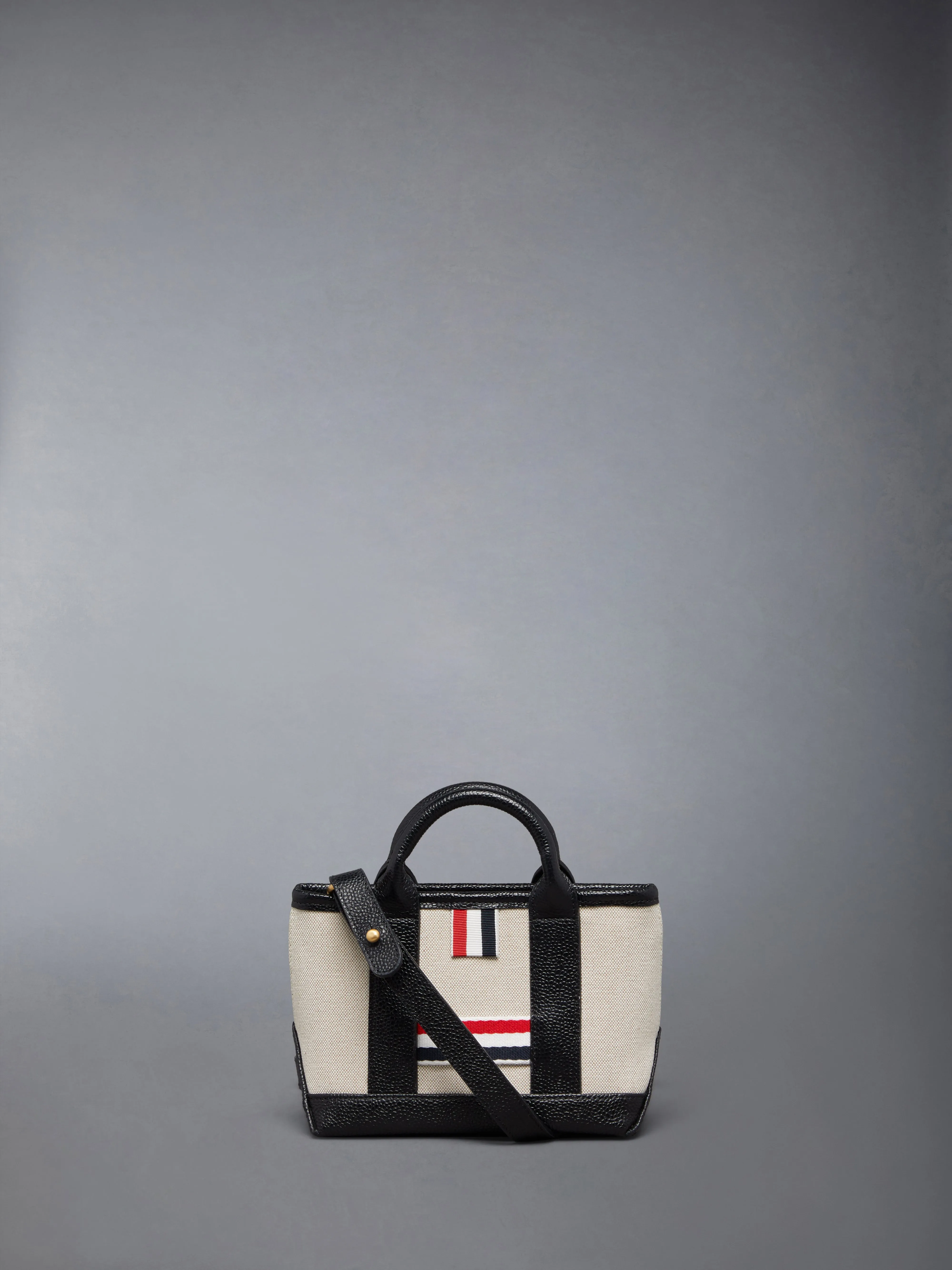COTTON CANVAS MICRO TOOL TOTE sold by Thom Browne