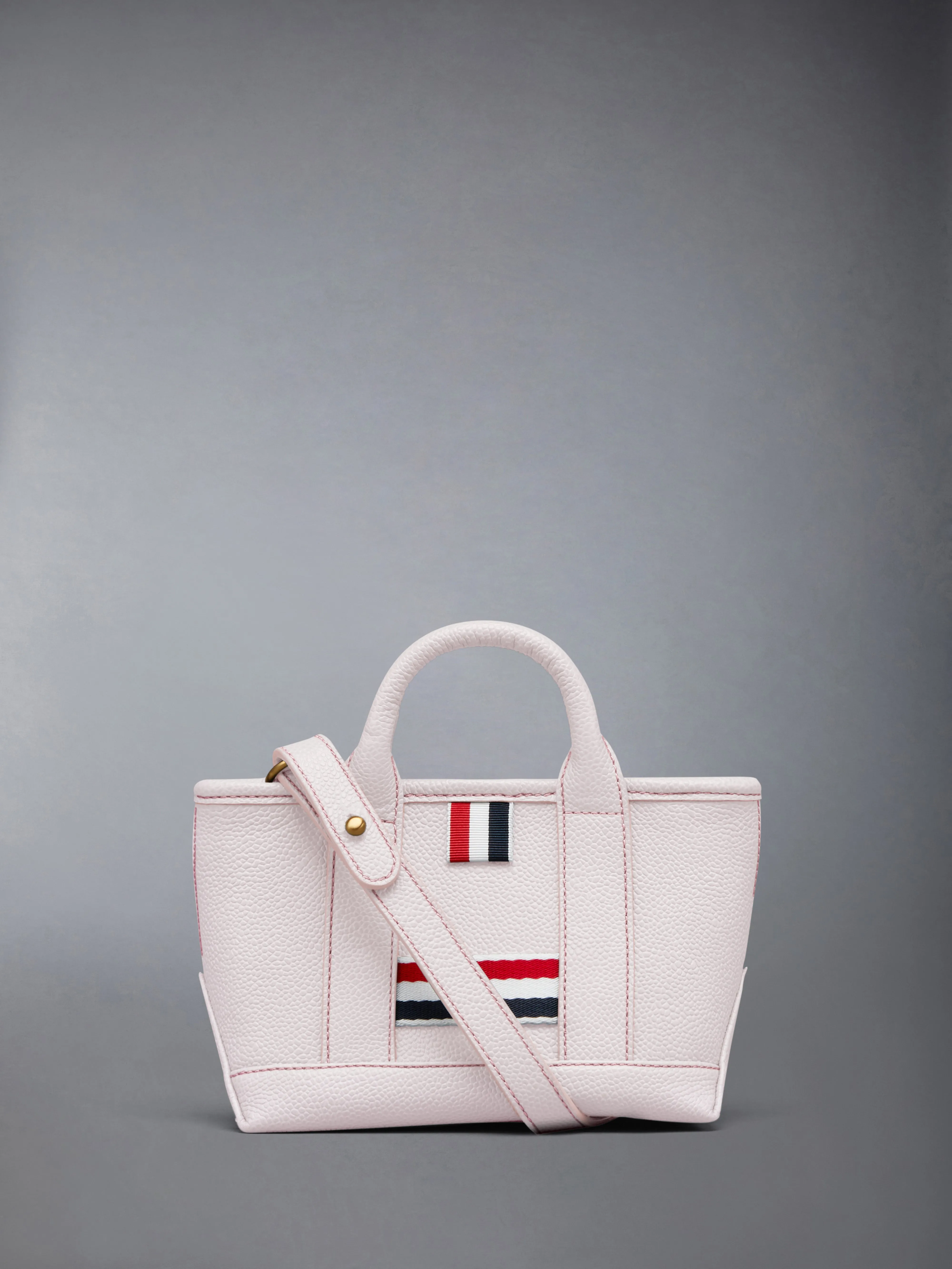 PEBBLE GRAIN MICRO TOOL TOTE BAG sold by Thom Browne