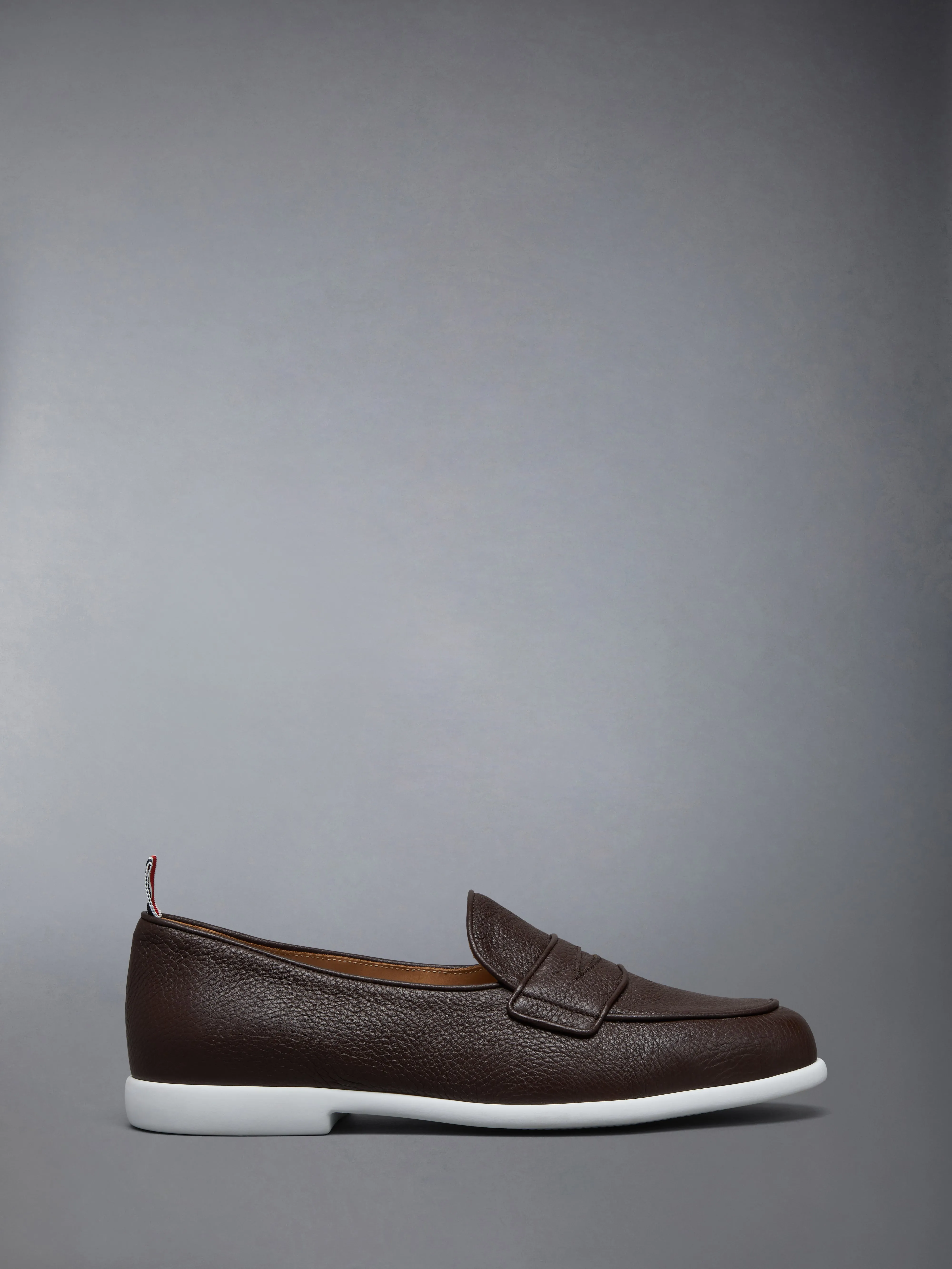 DEERSKIN LEATHER VARSITY PENNY LOAFER sold by Thom Browne