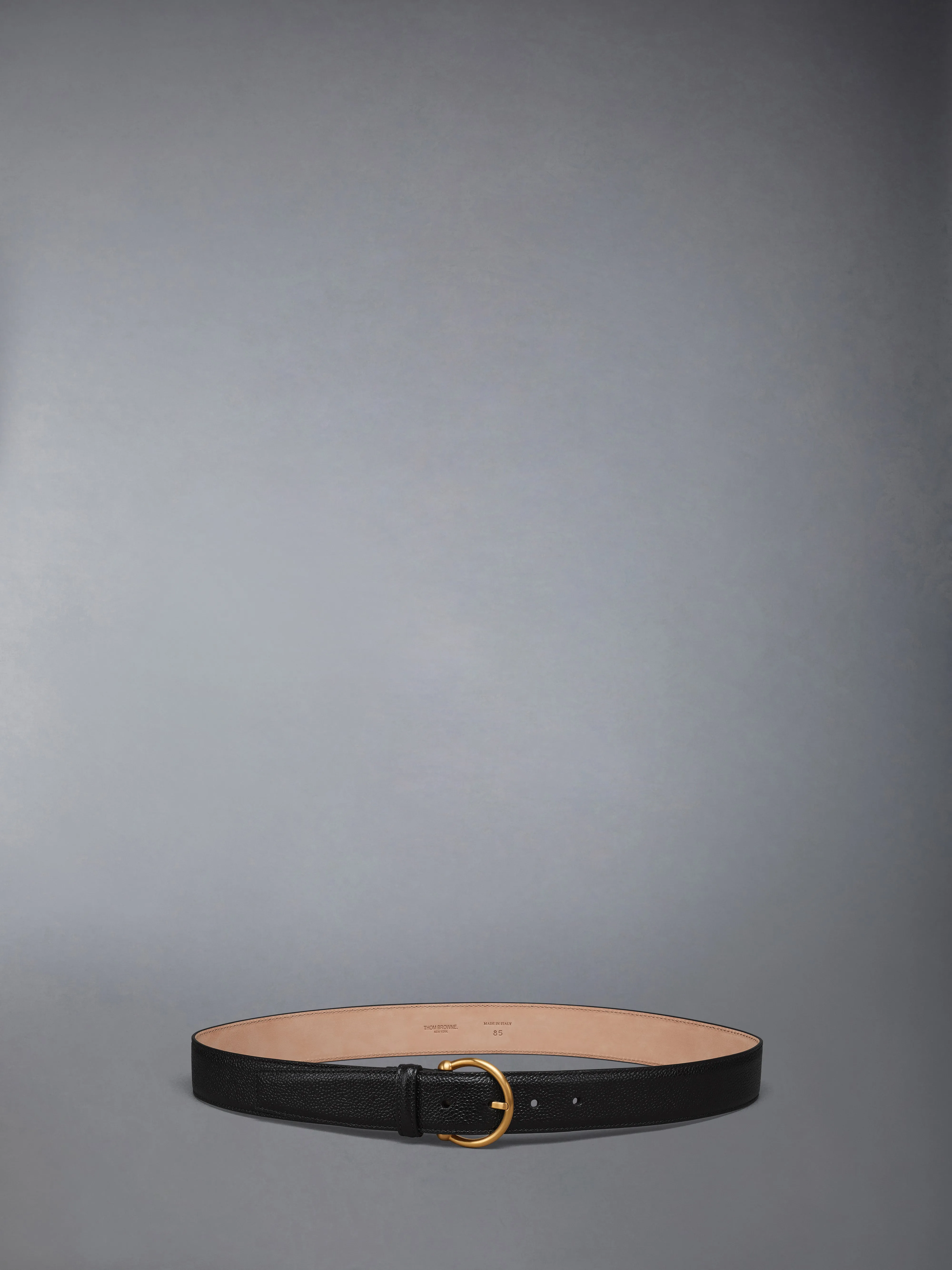 PEBBLE GRAIN ROUND BUCKLE BELT sold by Thom Browne