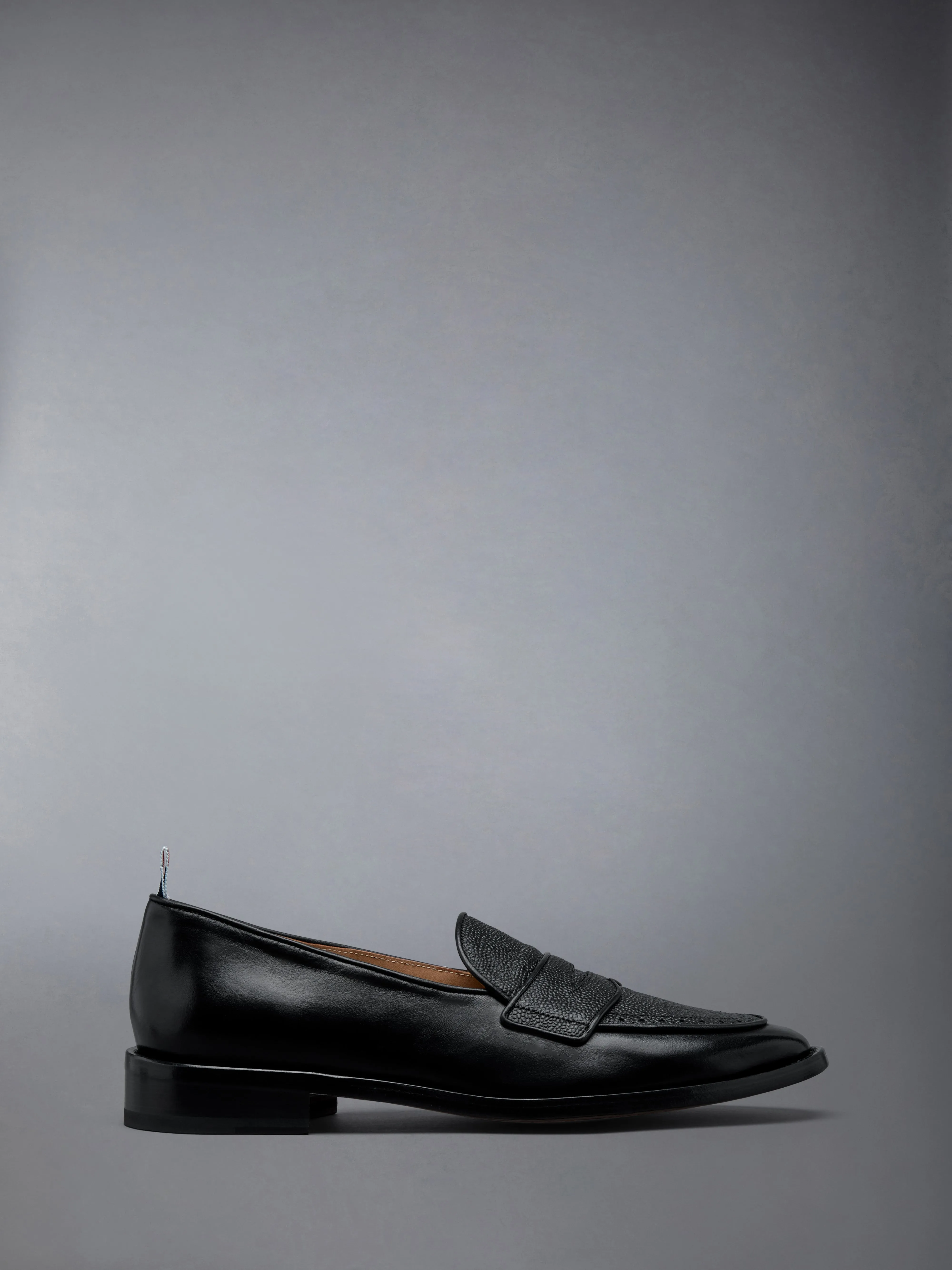 VITELLO LEATHER VARSITY PENNY LOAFER sold by Thom Browne