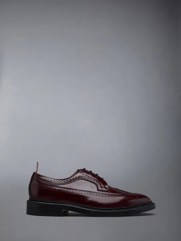 POLISHED LEATHER LONGWING BROGUES sold by Thom Browne