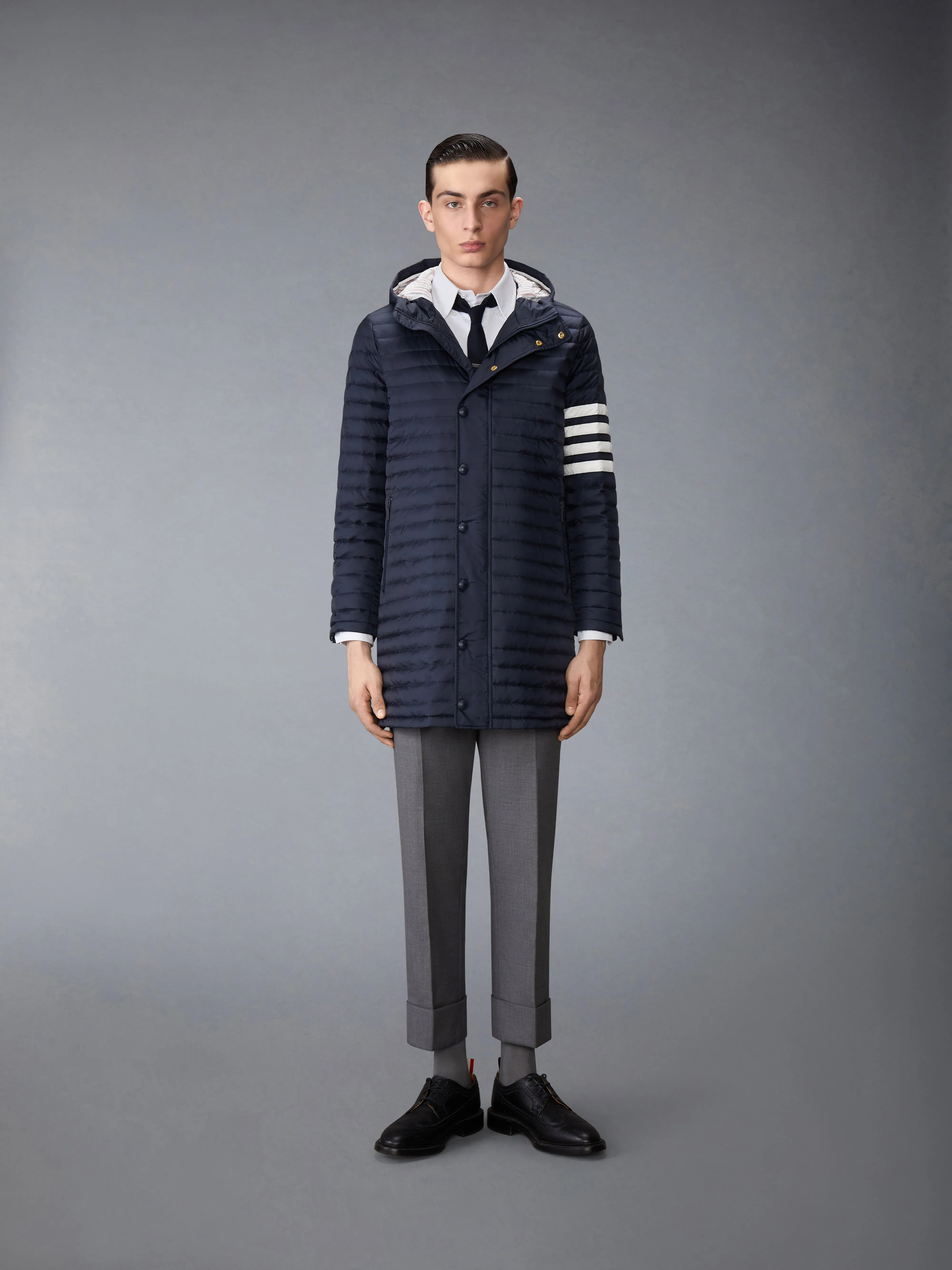 MATTE NYLON DOWN FILL QUILTED 4-BAR COAT sold by Thom Browne