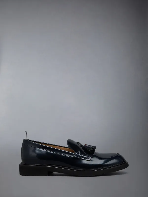 SPAZZOLATO LEATHER TASSLE LOAFER sold by Thom Browne