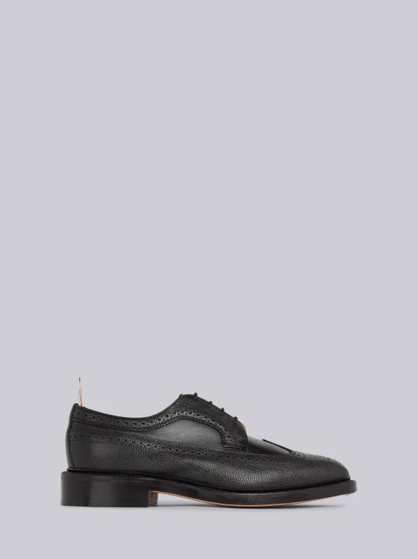 BLACK PEBBLED CALFSKIN MIX LONGWING BROGUE sold by Thom Browne