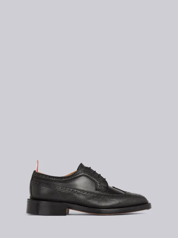 BLACK PEBBLED CALFSKIN MIX LONGWING BROGUE sold by Thom Browne