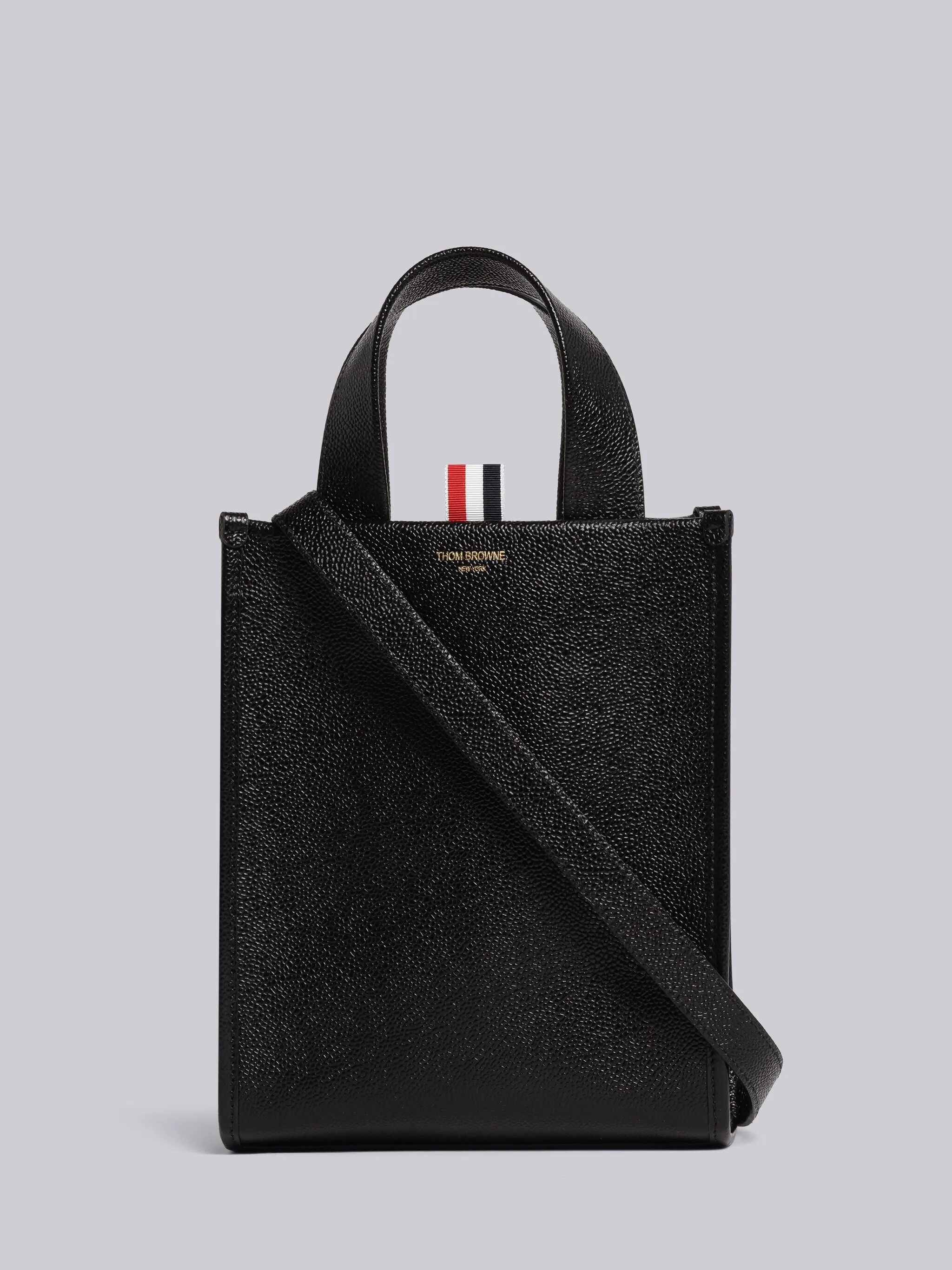PEBBLE GRAIN LEATHER SMALL SQUARE TOTE BAG sold by Thom Browne