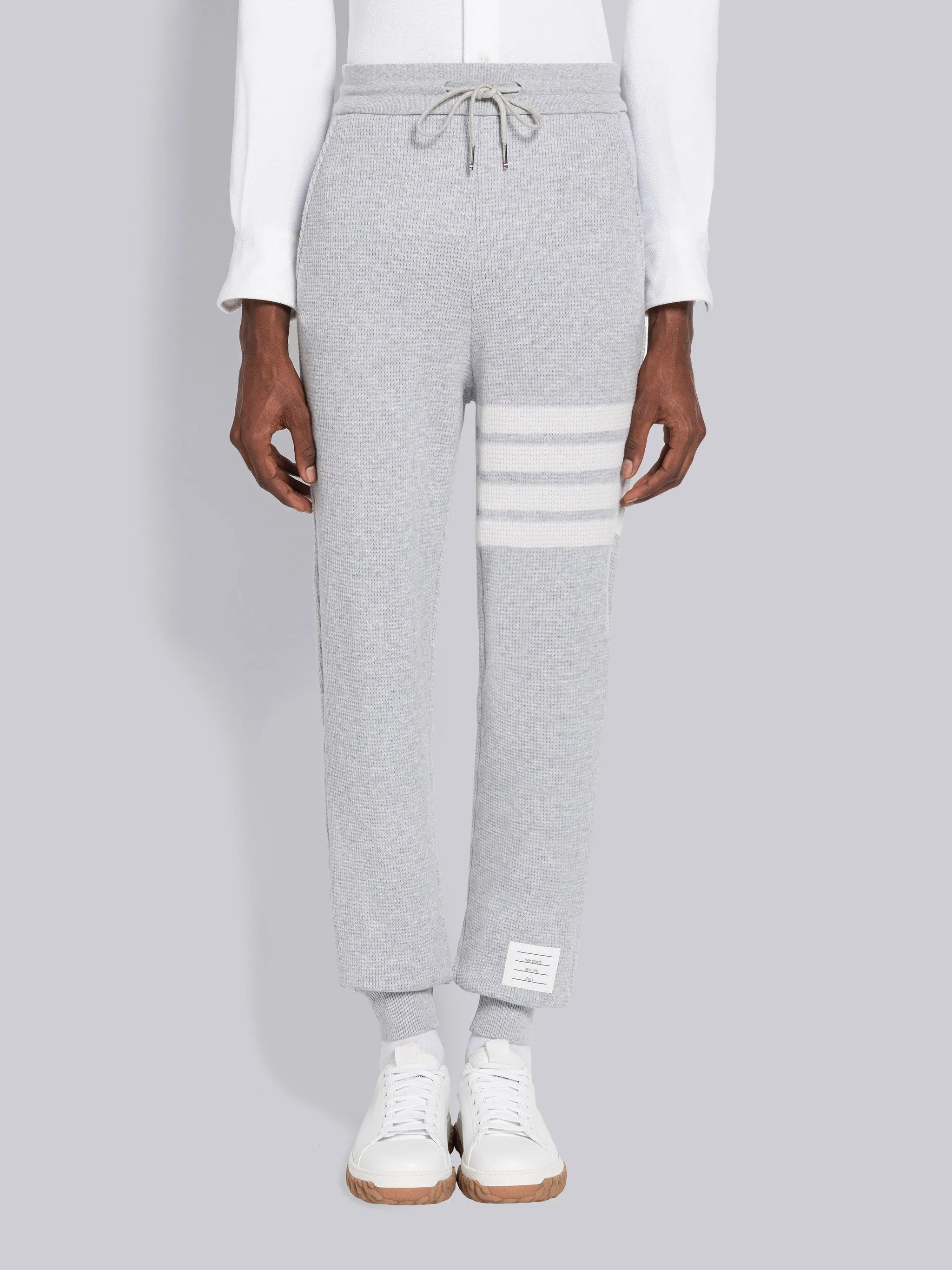 CASHMERE WAFFLE 4-BAR SWEATPANTS sold by Thom Browne