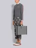 MEDIUM GREY MONOGRAM COATED CANVAS LEATHER FRAME ATTACHE CASE sold by Thom Browne