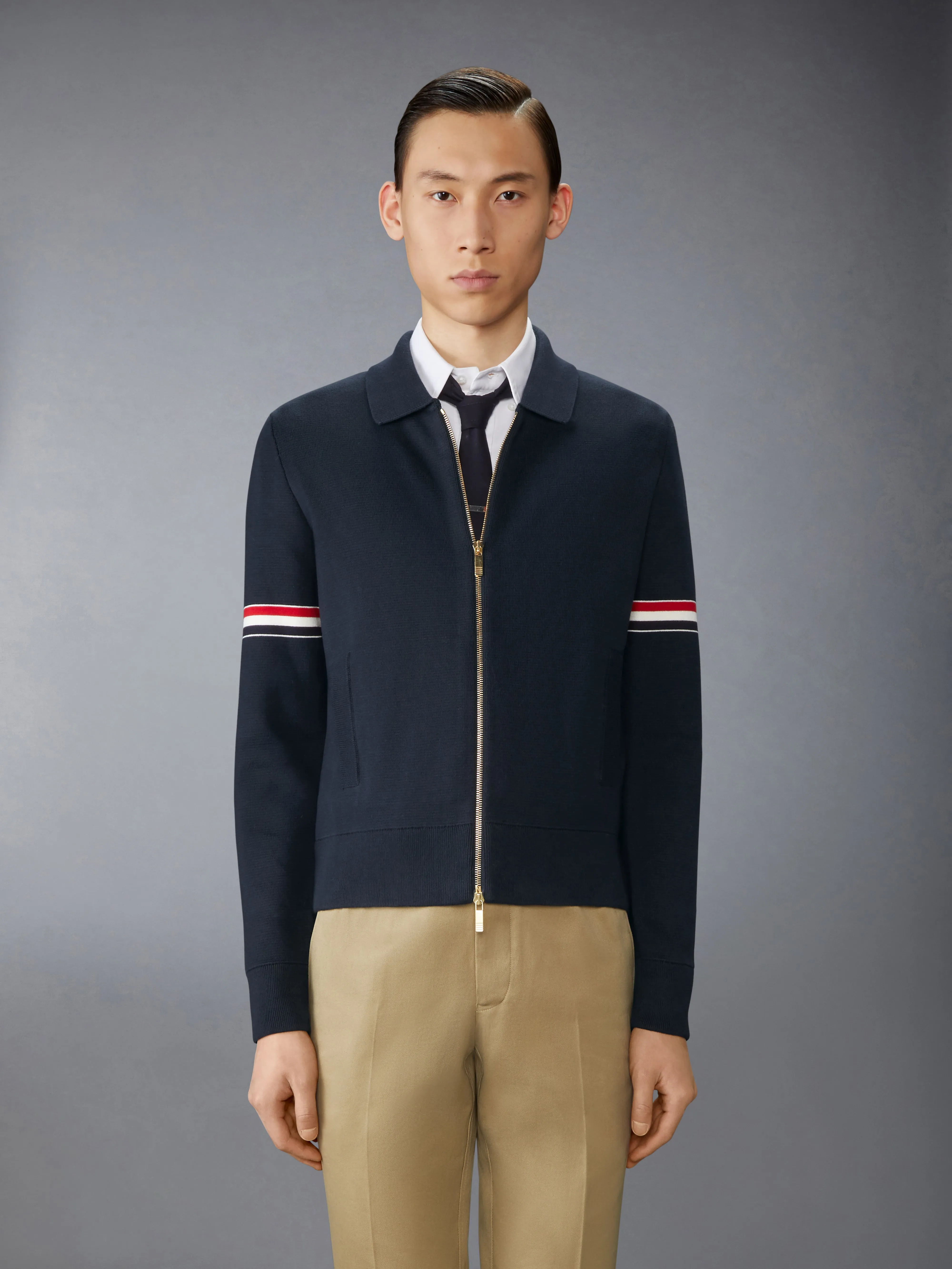 COTTON MILANO STITCH ARMBAND BOMBER JACKET sold by Thom Browne