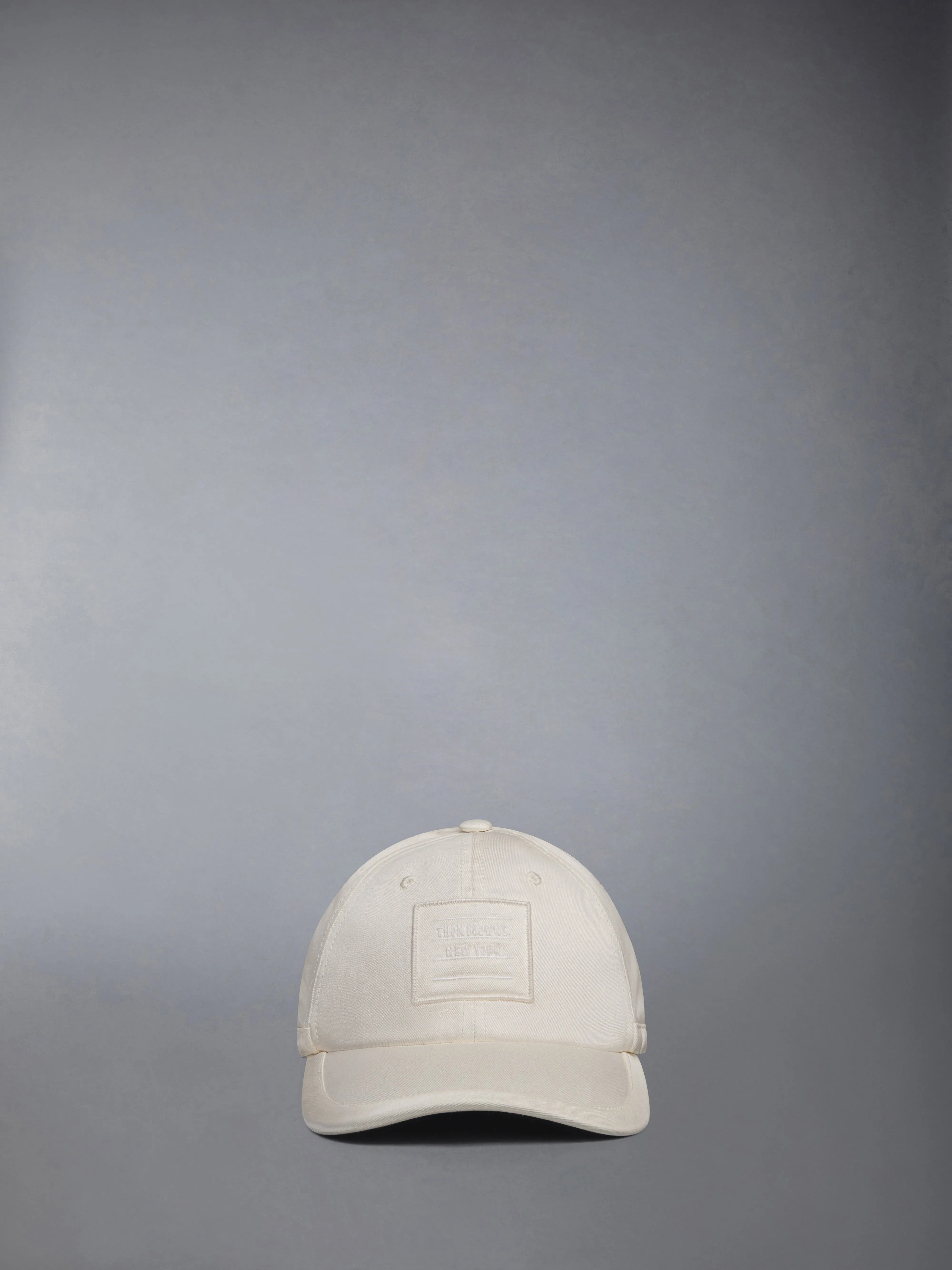 COTTON TWILL 6-PANEL BASEBALL CAP sold by Thom Browne