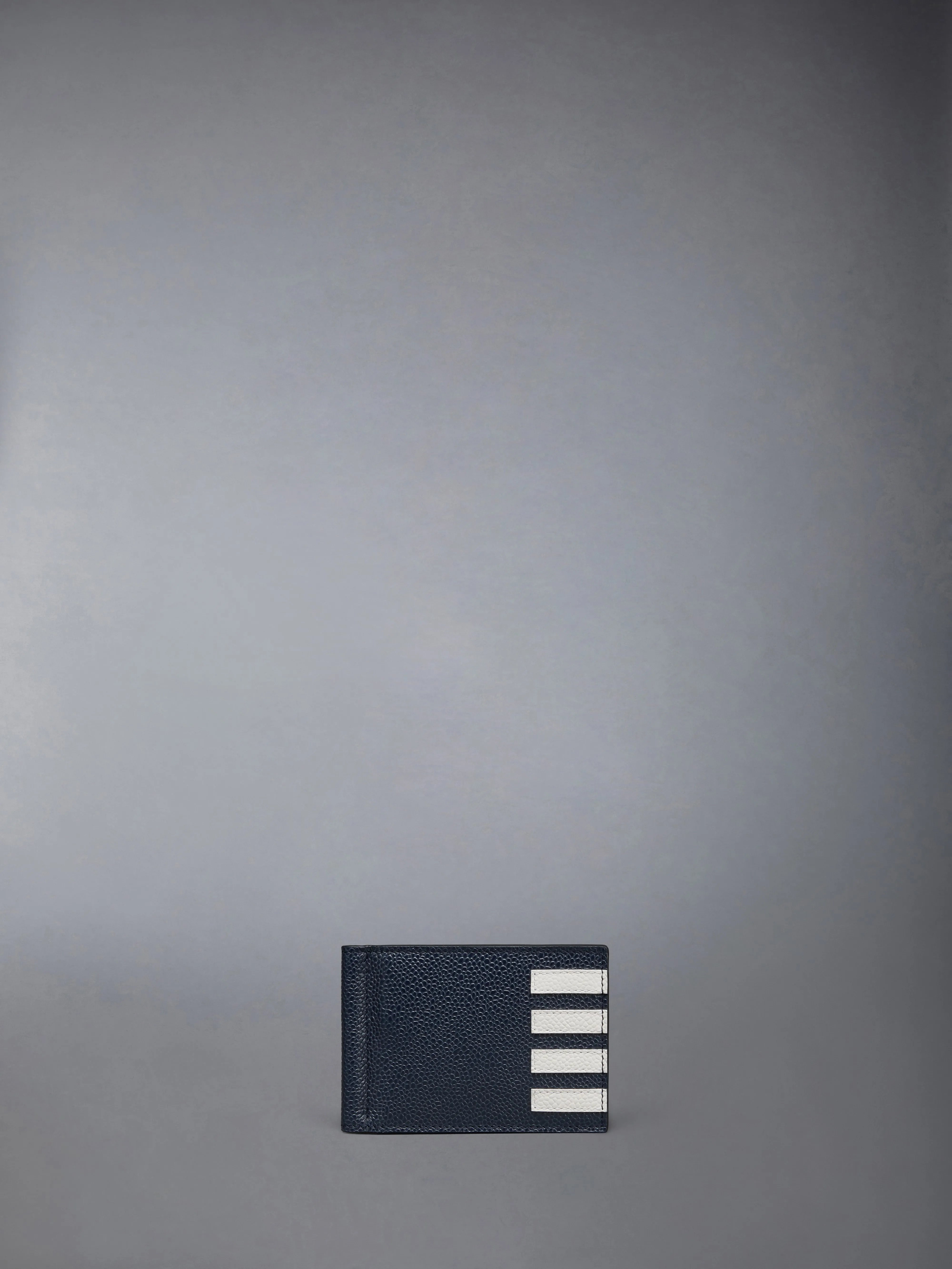 PEBBLE GRAIN 4-BAR MONEY CLIP WALLET sold by Thom Browne
