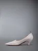 SOFT PATENT LEATHER WINGTIP 50MM CURVED HEEL PUMP sold by Thom Browne