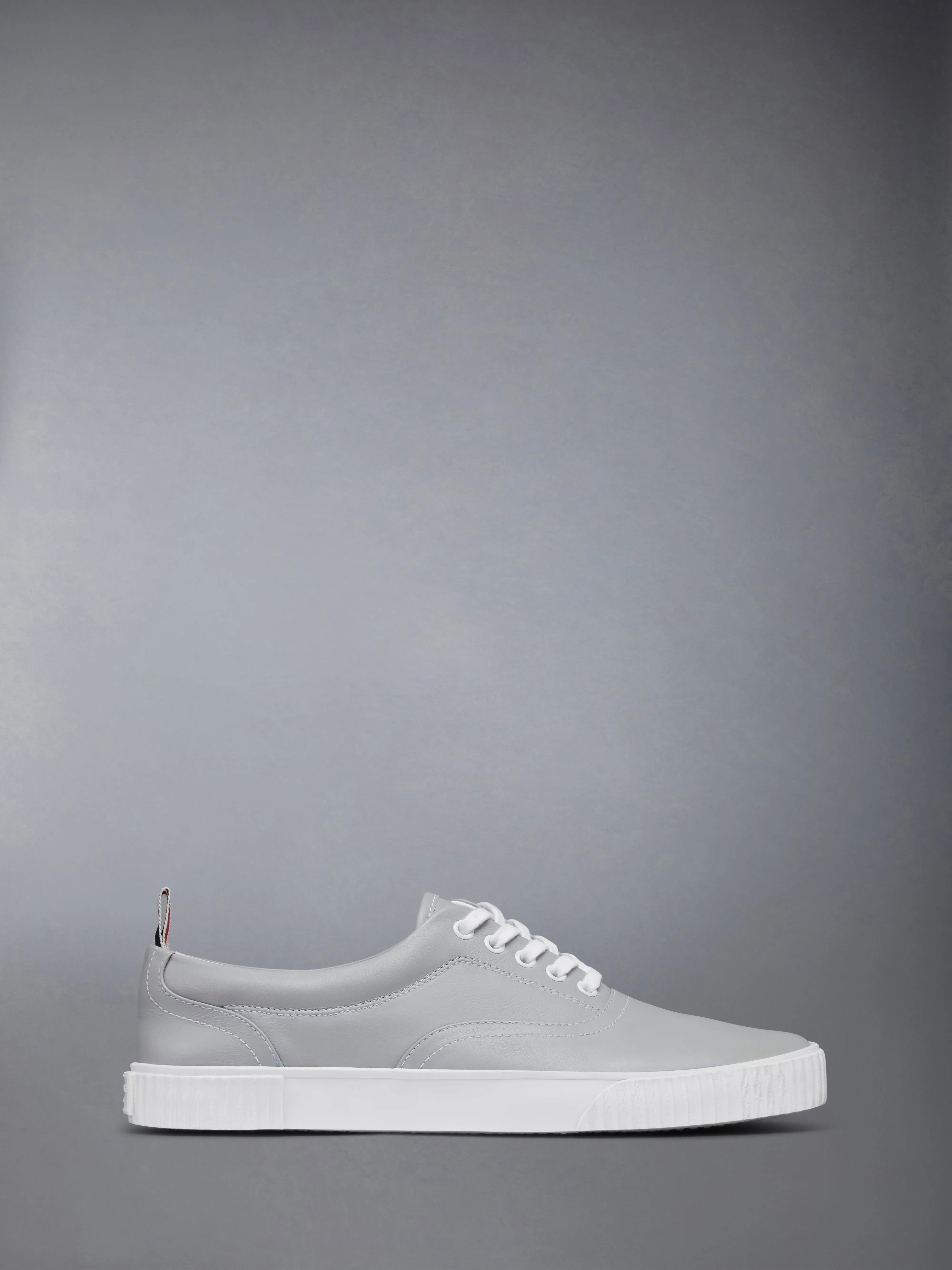 VITELLO CALF HERITAGE SNEAKERS sold by Thom Browne