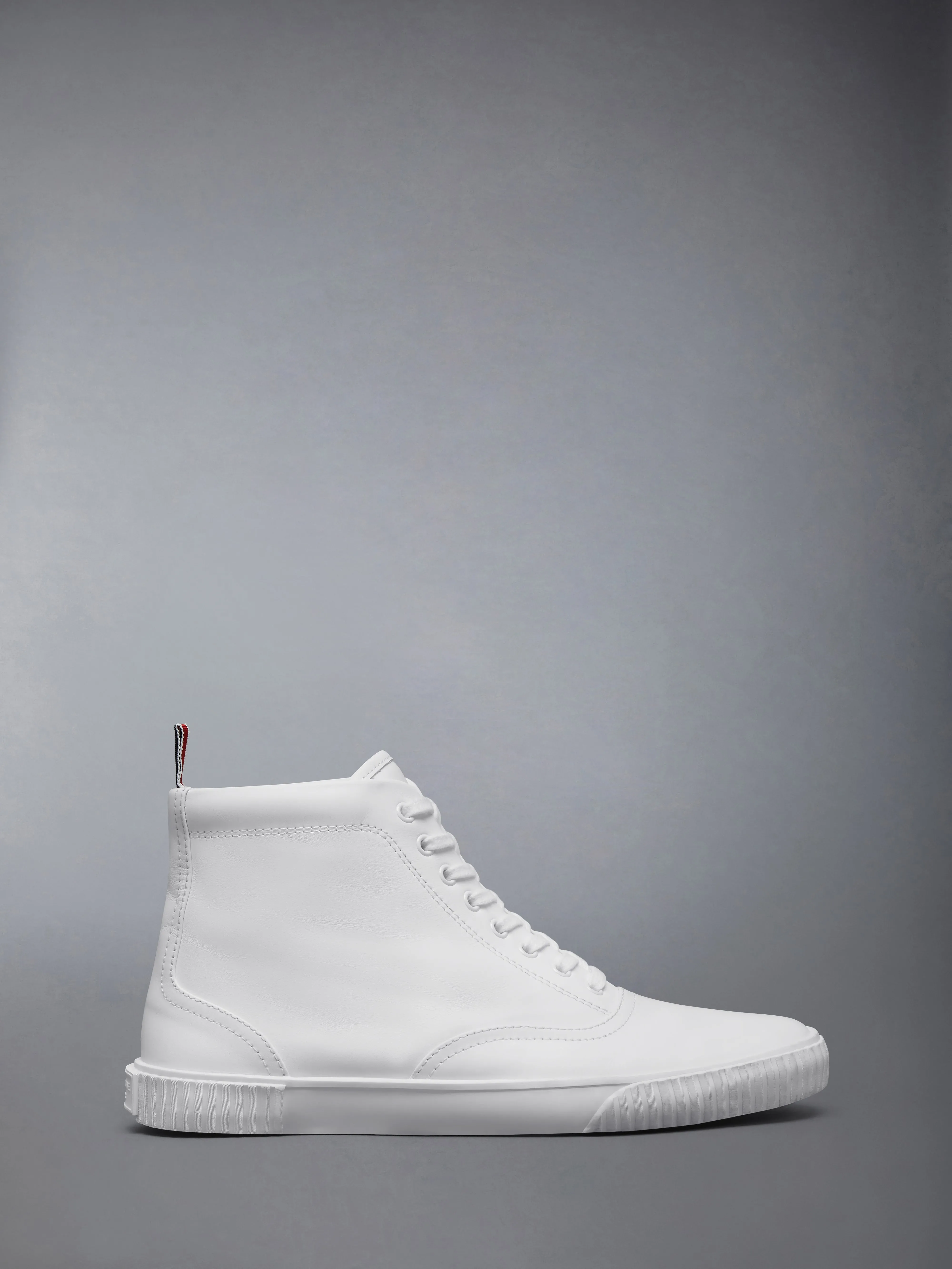 VITELLO CALF LEATHER HIGH TOP HERITAGE SNEAKERS sold by Thom Browne