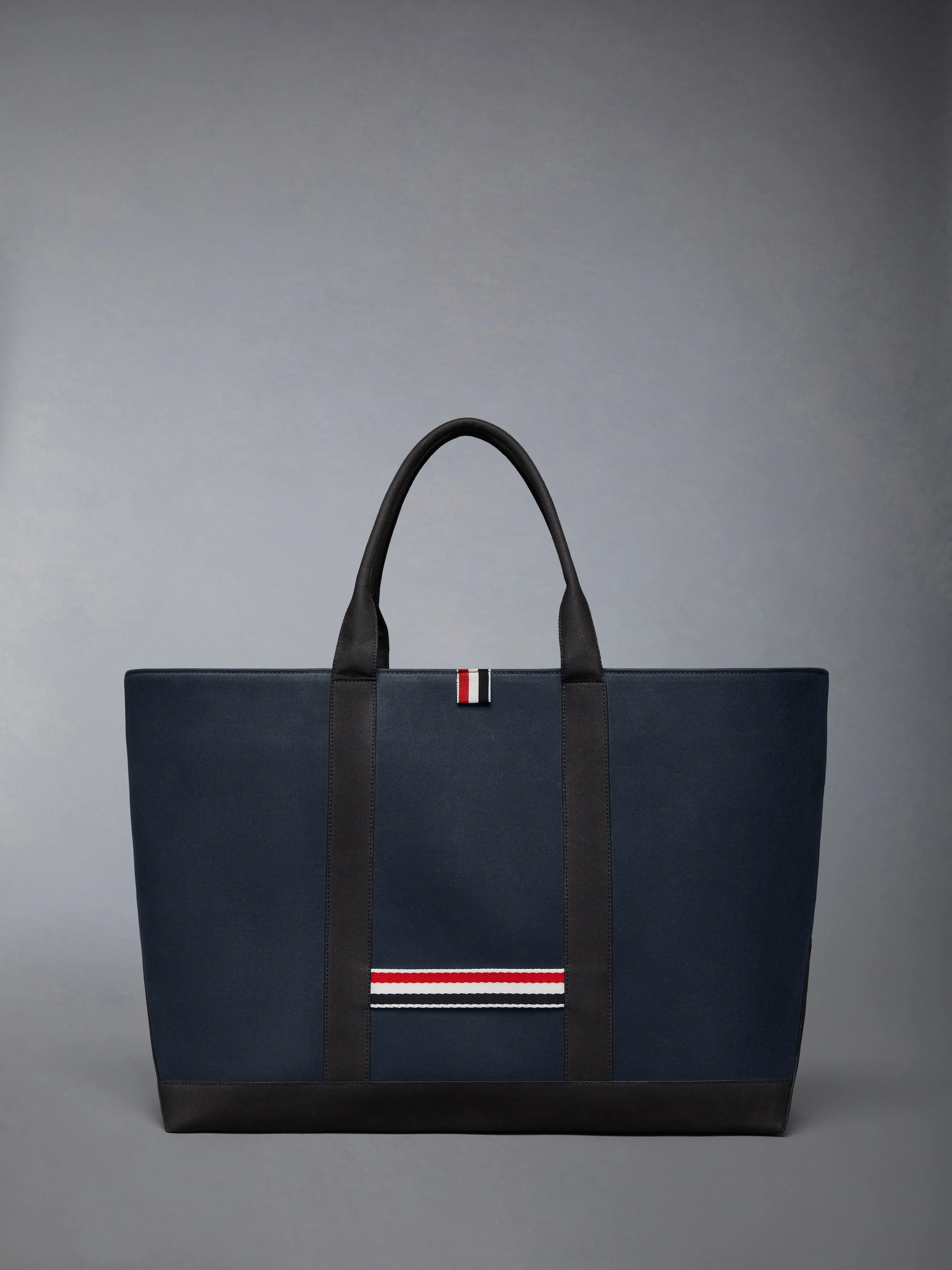 MEDIUM DRAWSTRING OPENING TOOL TOTE sold by Thom Browne