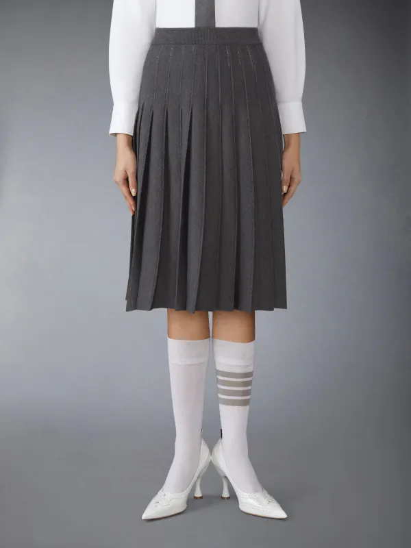 WOOL SILK POINTELLE PLEATED SKIRT sold by Thom Browne