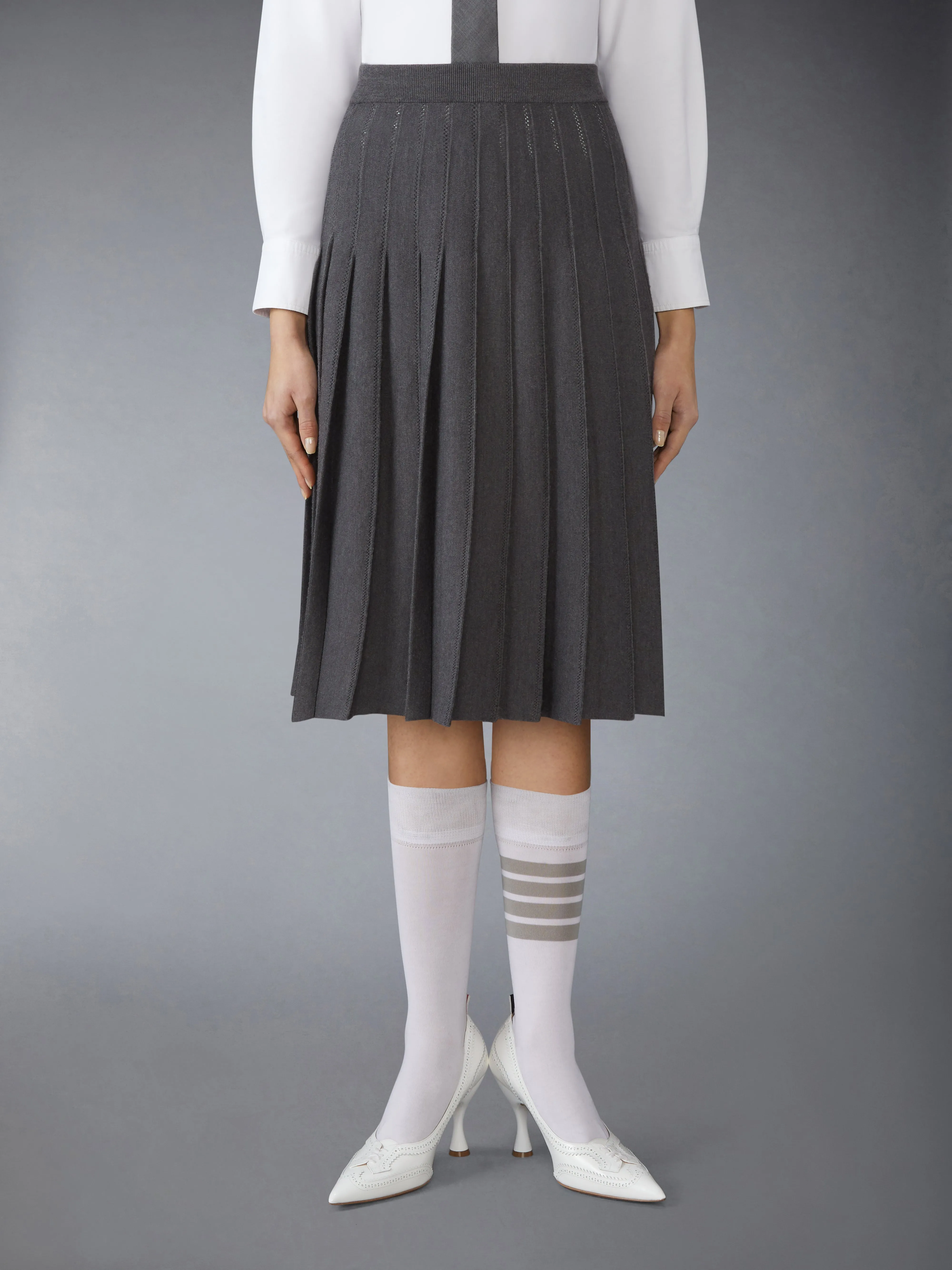 WOOL SILK POINTELLE PLEATED SKIRT sold by Thom Browne