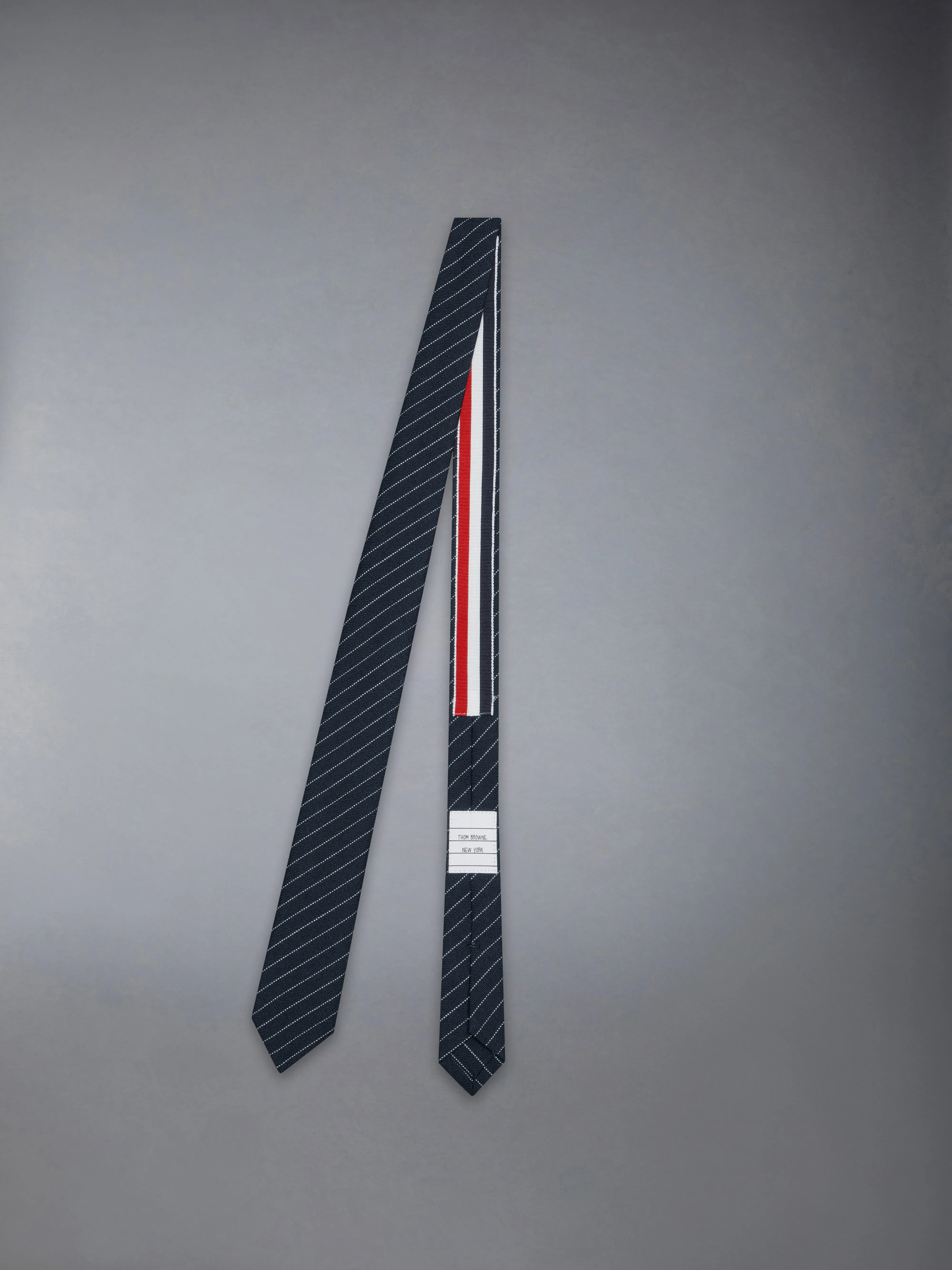 PINSTRIPE HIGH TWIST WOOL SHORT TIE sold by Thom Browne product image thumbnail 2