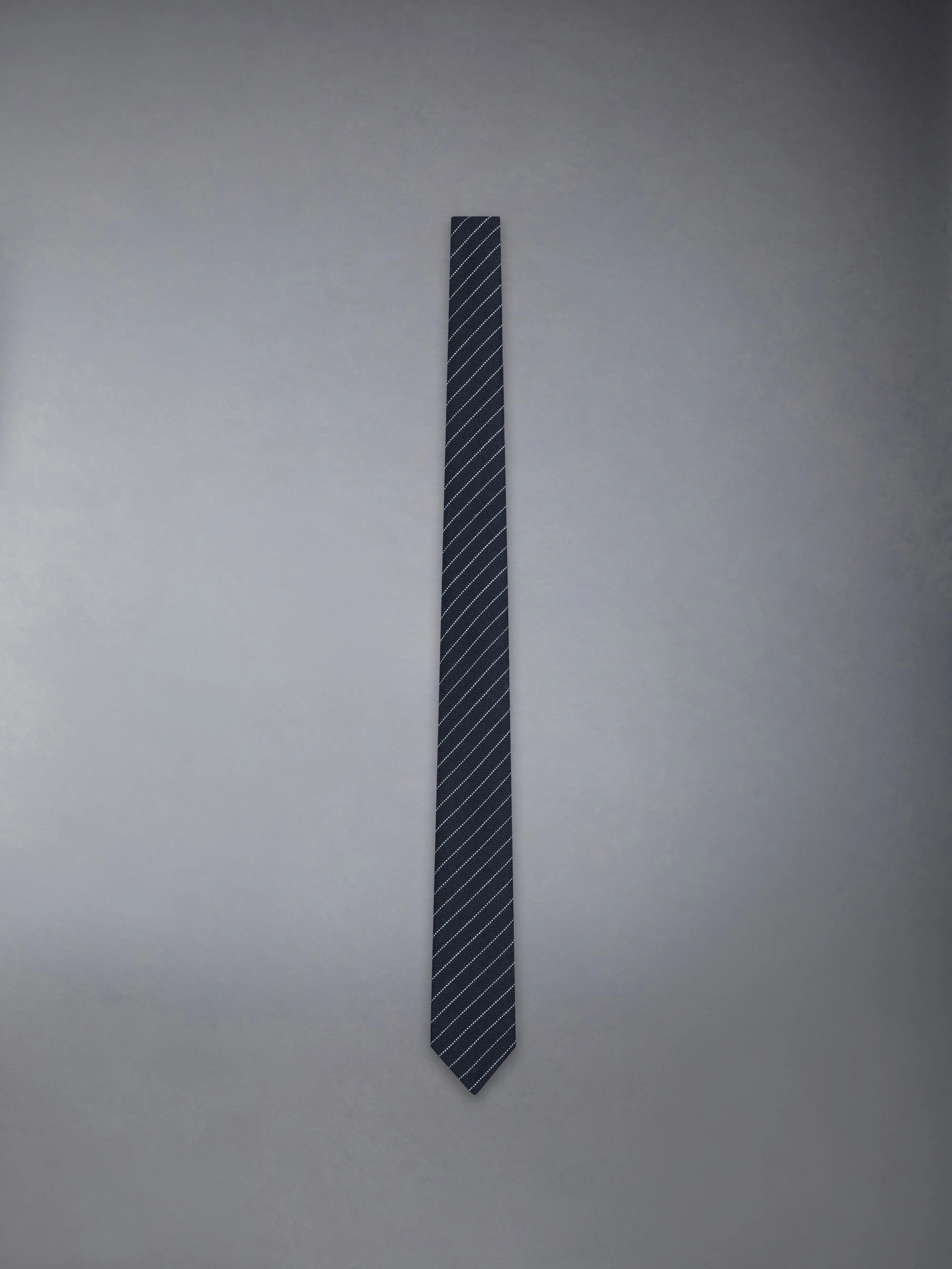 PINSTRIPE HIGH TWIST WOOL SHORT TIE sold by Thom Browne