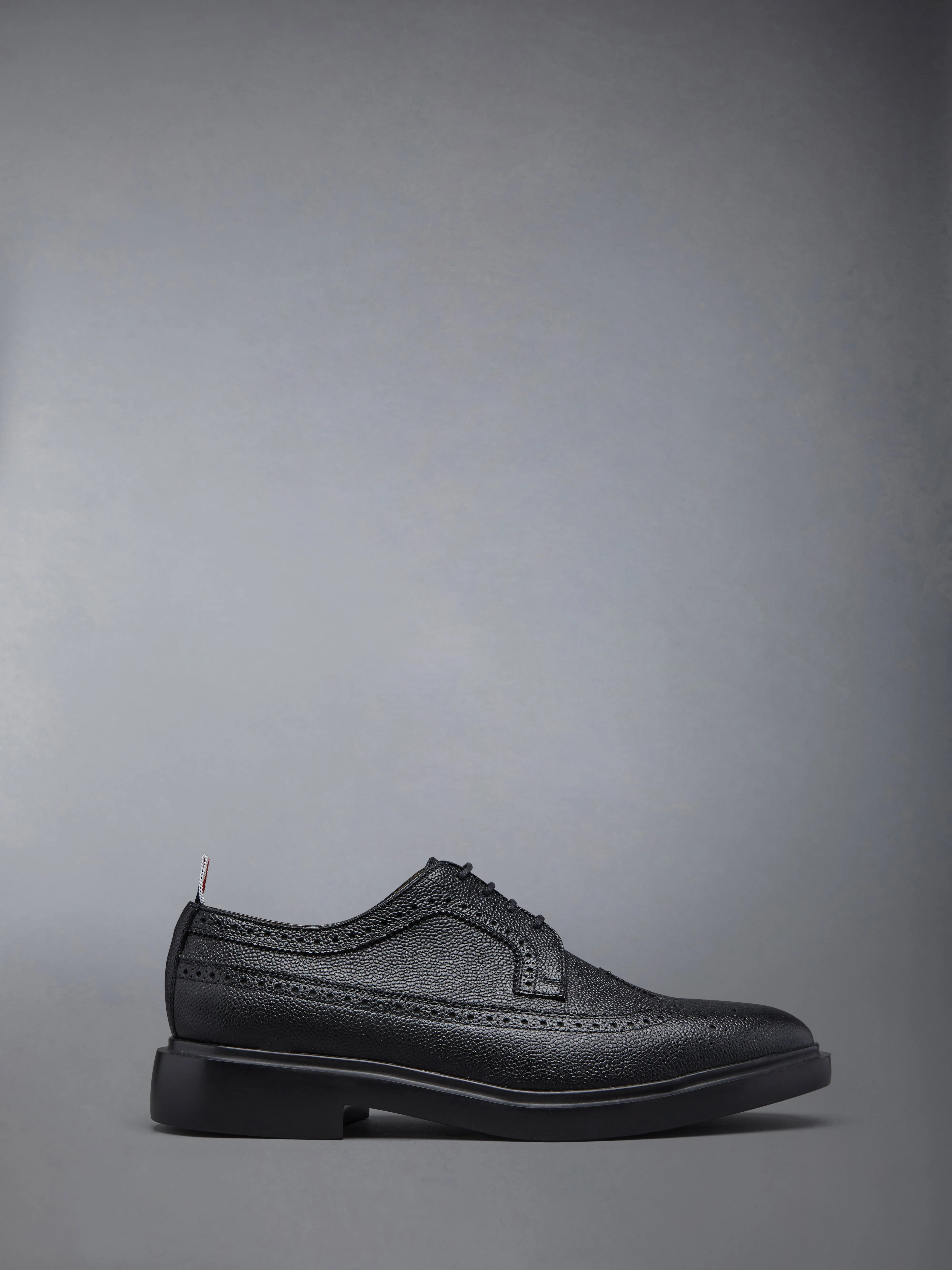PEBBLE GRAIN LONGWING BROGUE sold by Thom Browne