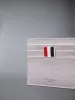 PEBBLE GRAIN NOTE COMPARTMENT CARD HOLDER sold by Thom Browne
