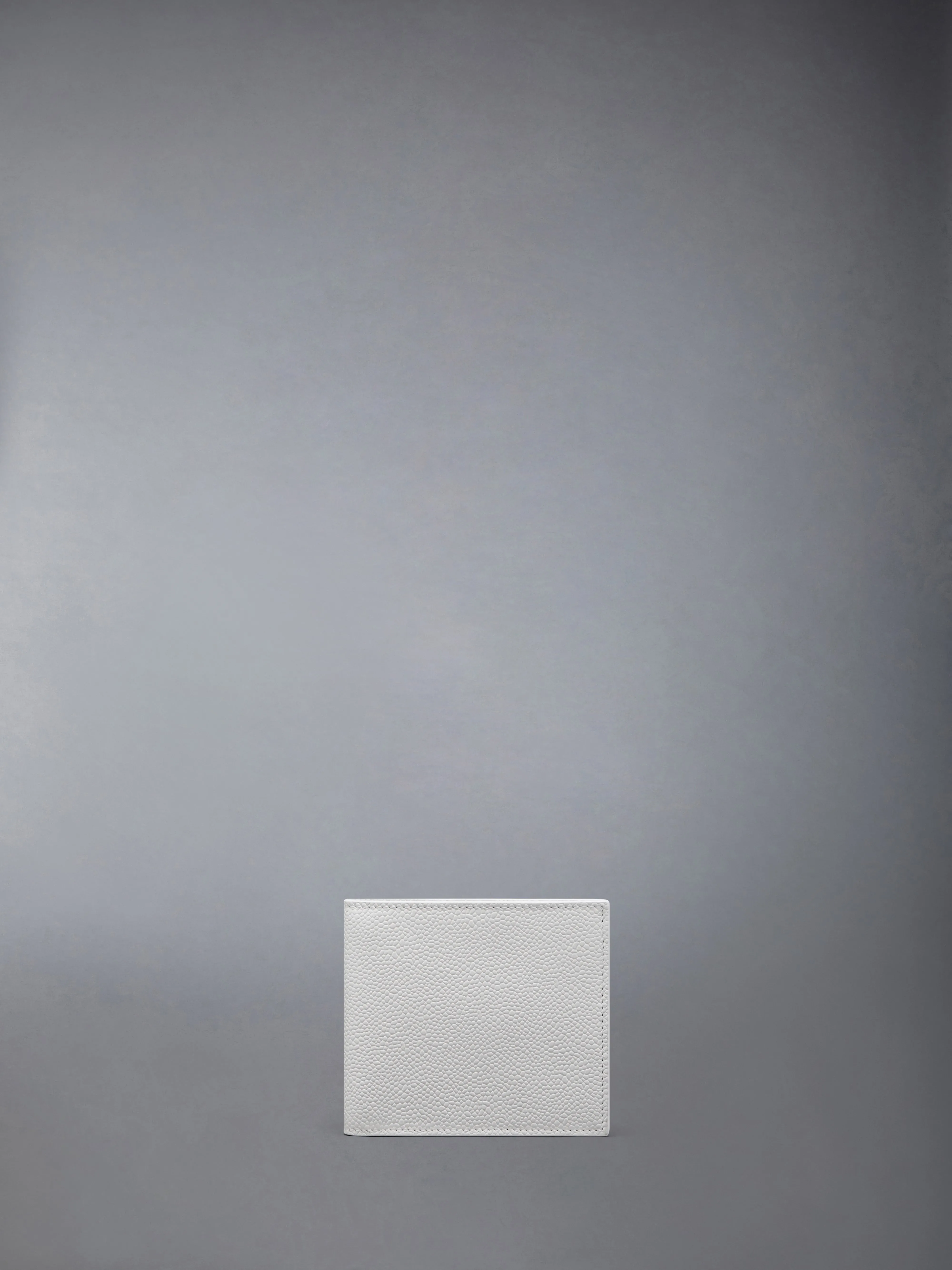 PEBBLE GRAIN BIFOLD sold by Thom Browne