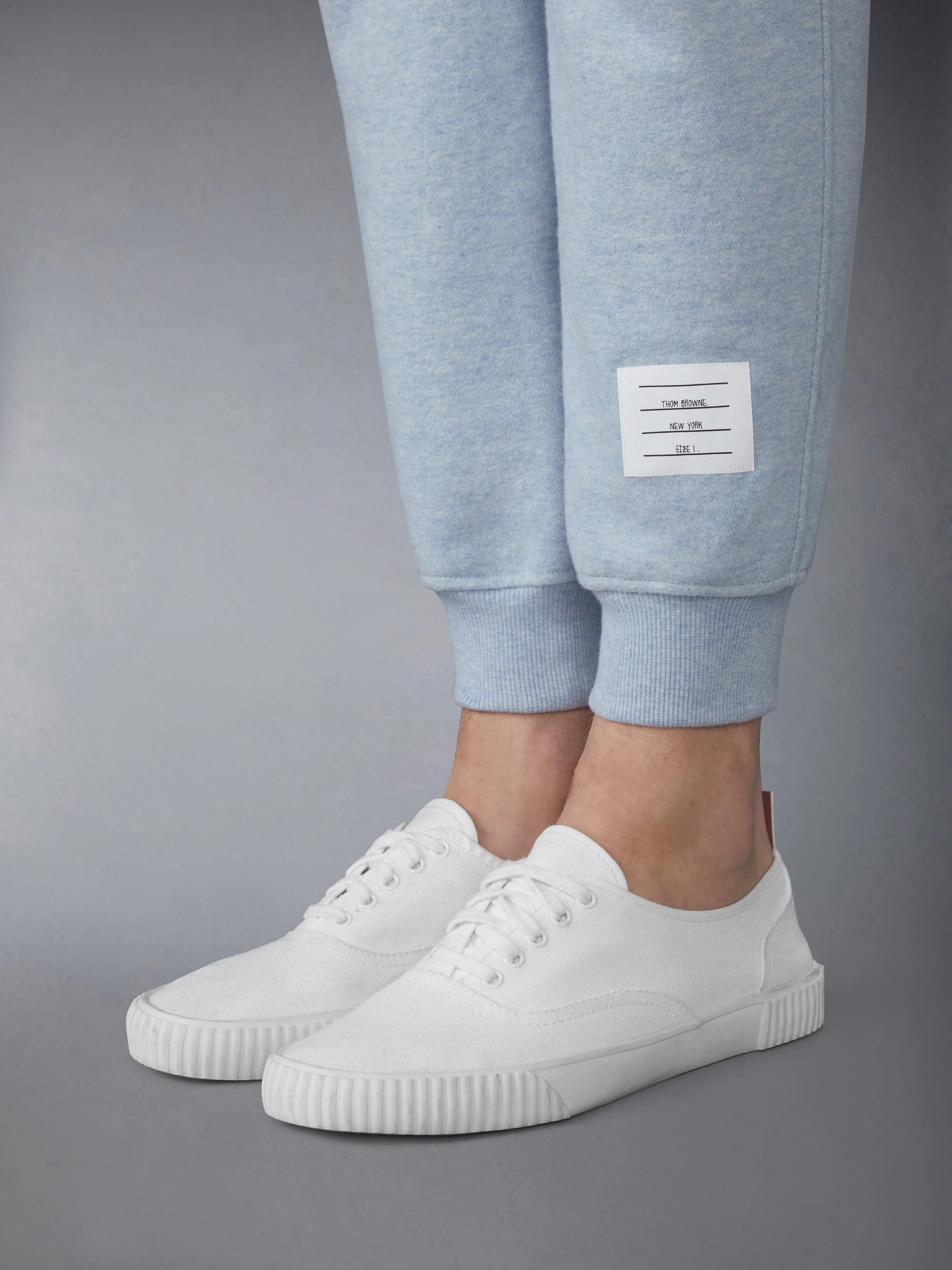 MELANGE BRUSHED LOOPBACK 4-BAR SWEATPANTS sold by Thom Browne product image thumbnail 4