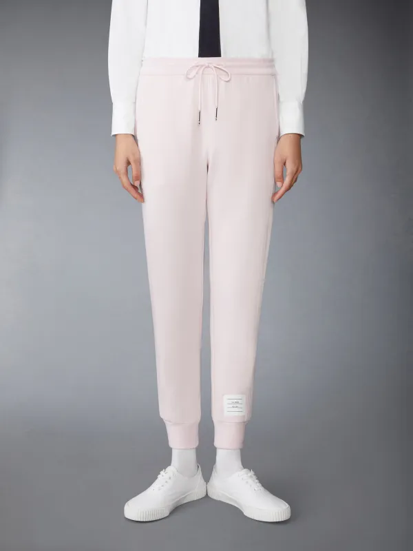 SOLID LOOPBACK 4-BAR SWEATPANTS sold by Thom Browne