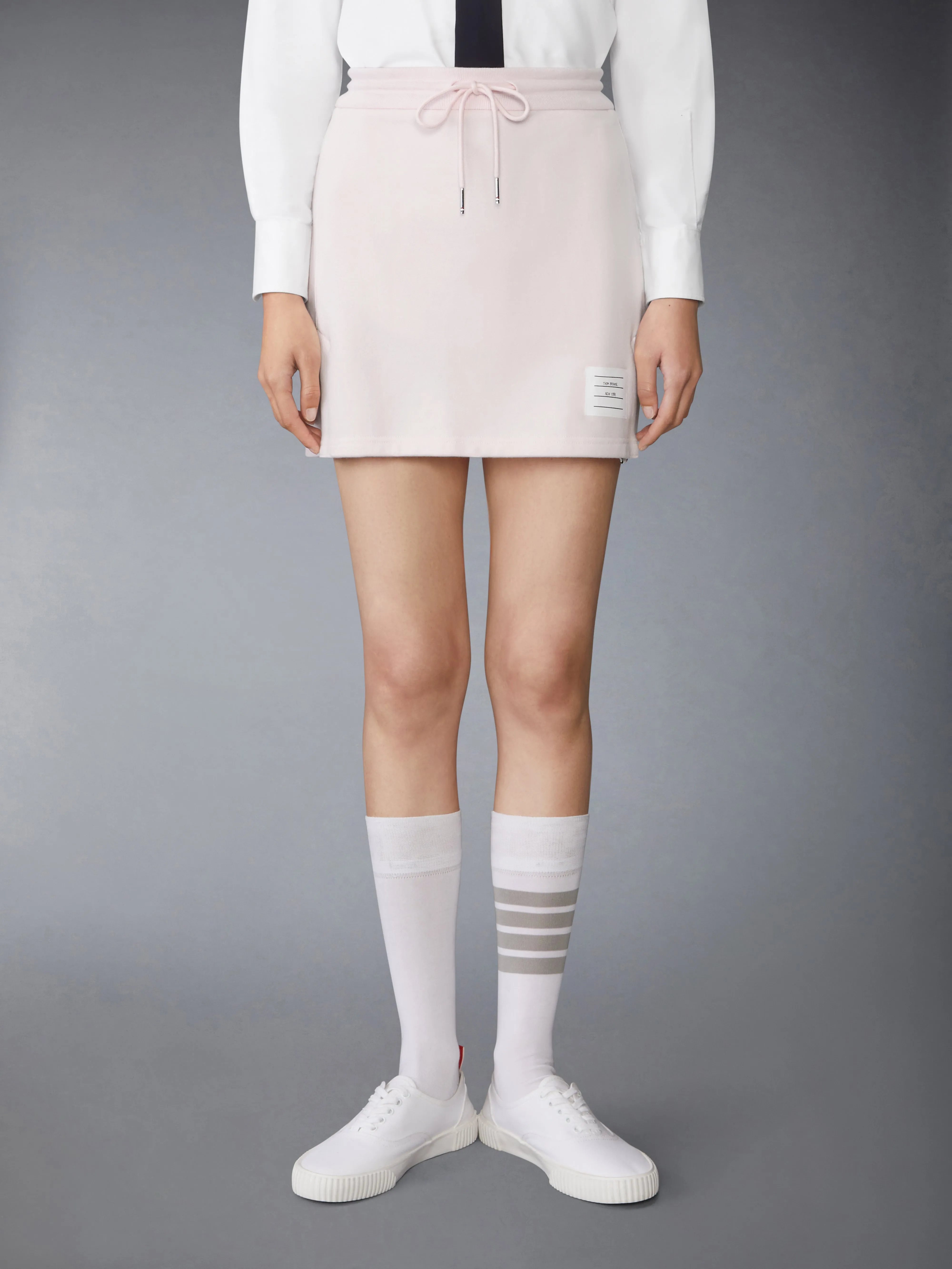CLASSIC 4-BAR JERSEY MINI SKIRT sold by Thom Browne