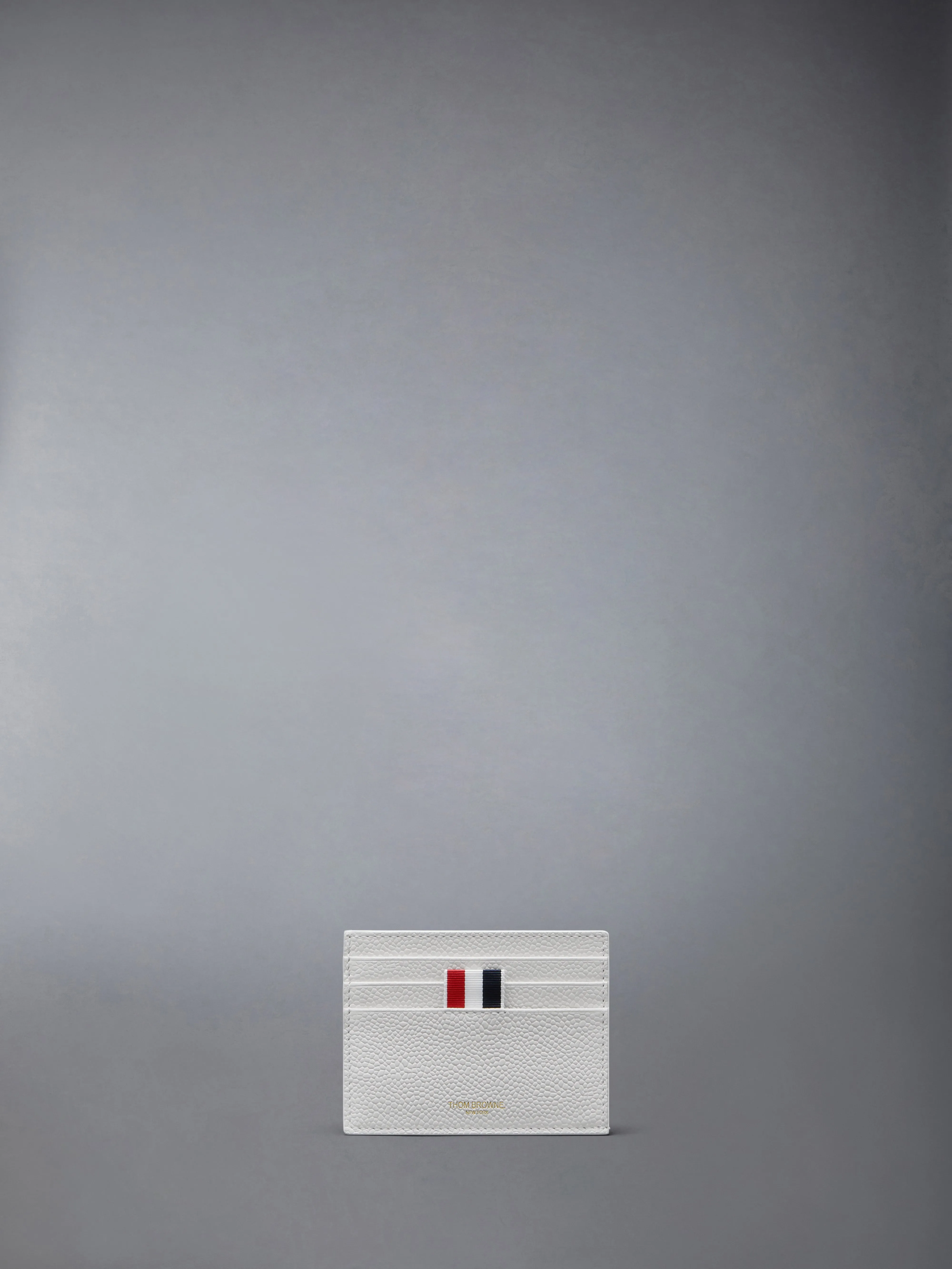 PEBBLE GRAIN NOTE COMPARTMENT CARD HOLDER sold by Thom Browne