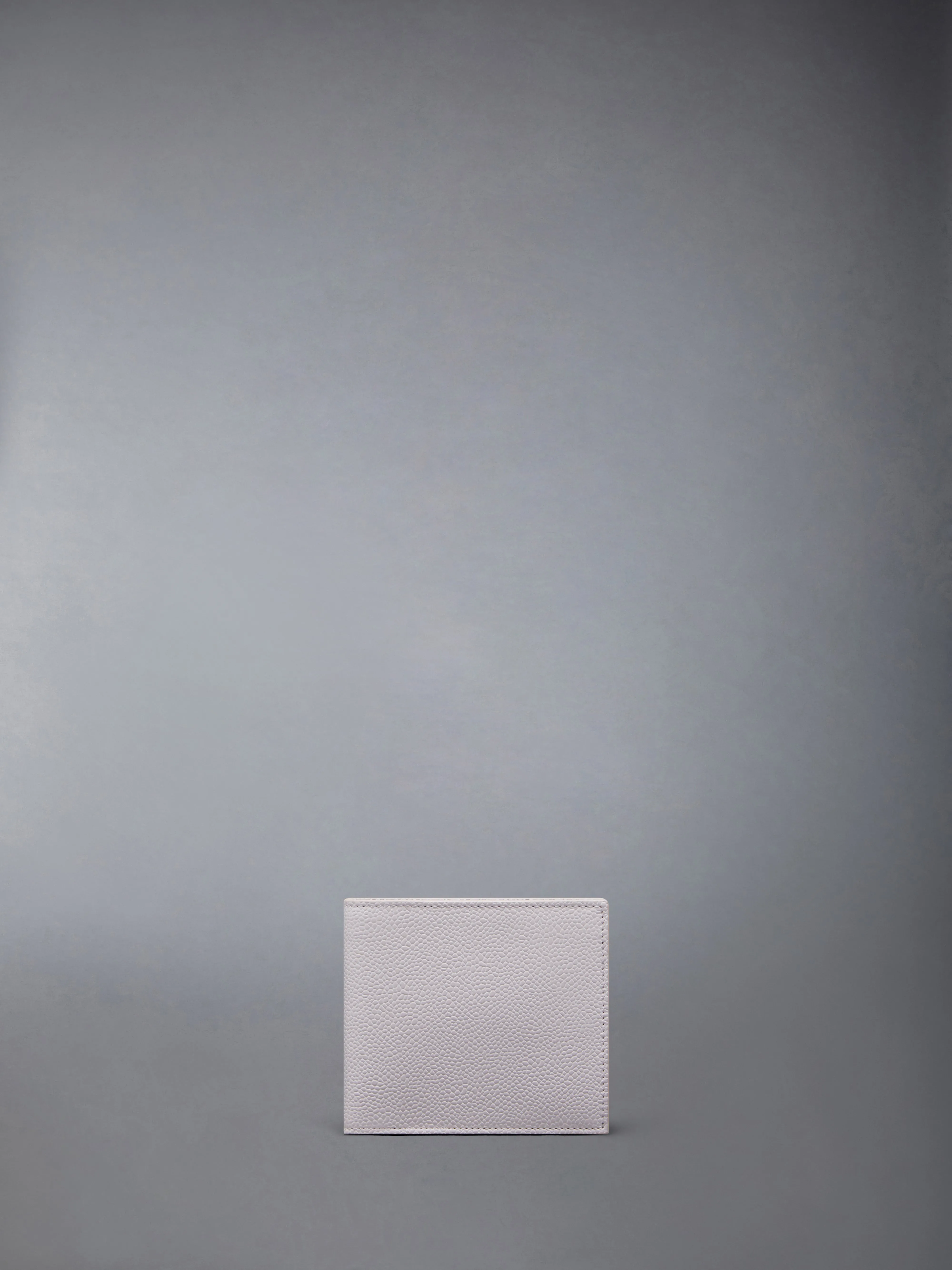 PEBBLE GRAIN BIFOLD sold by Thom Browne