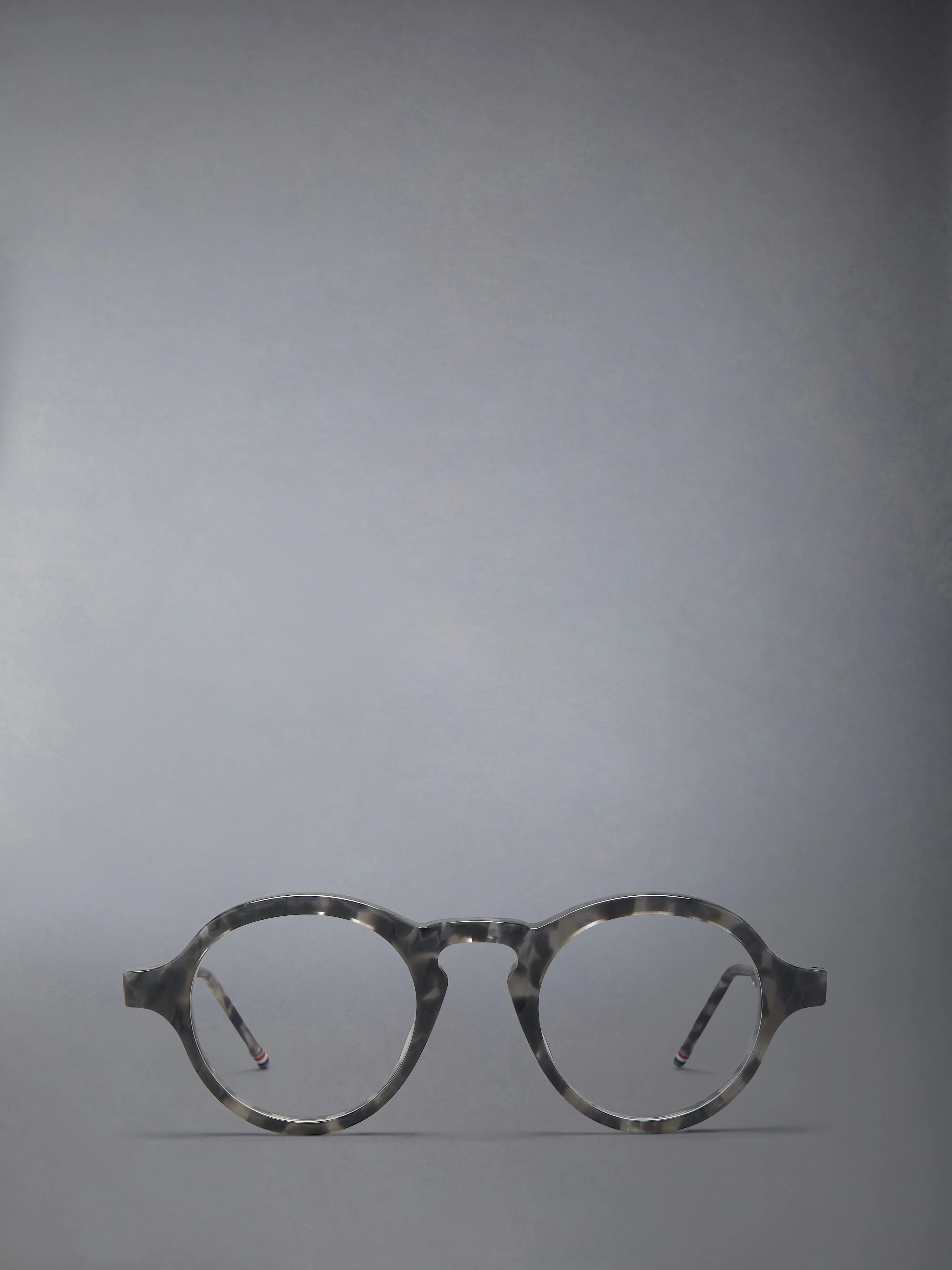 ACETATE ROUND EYEGLASSES sold by Thom Browne