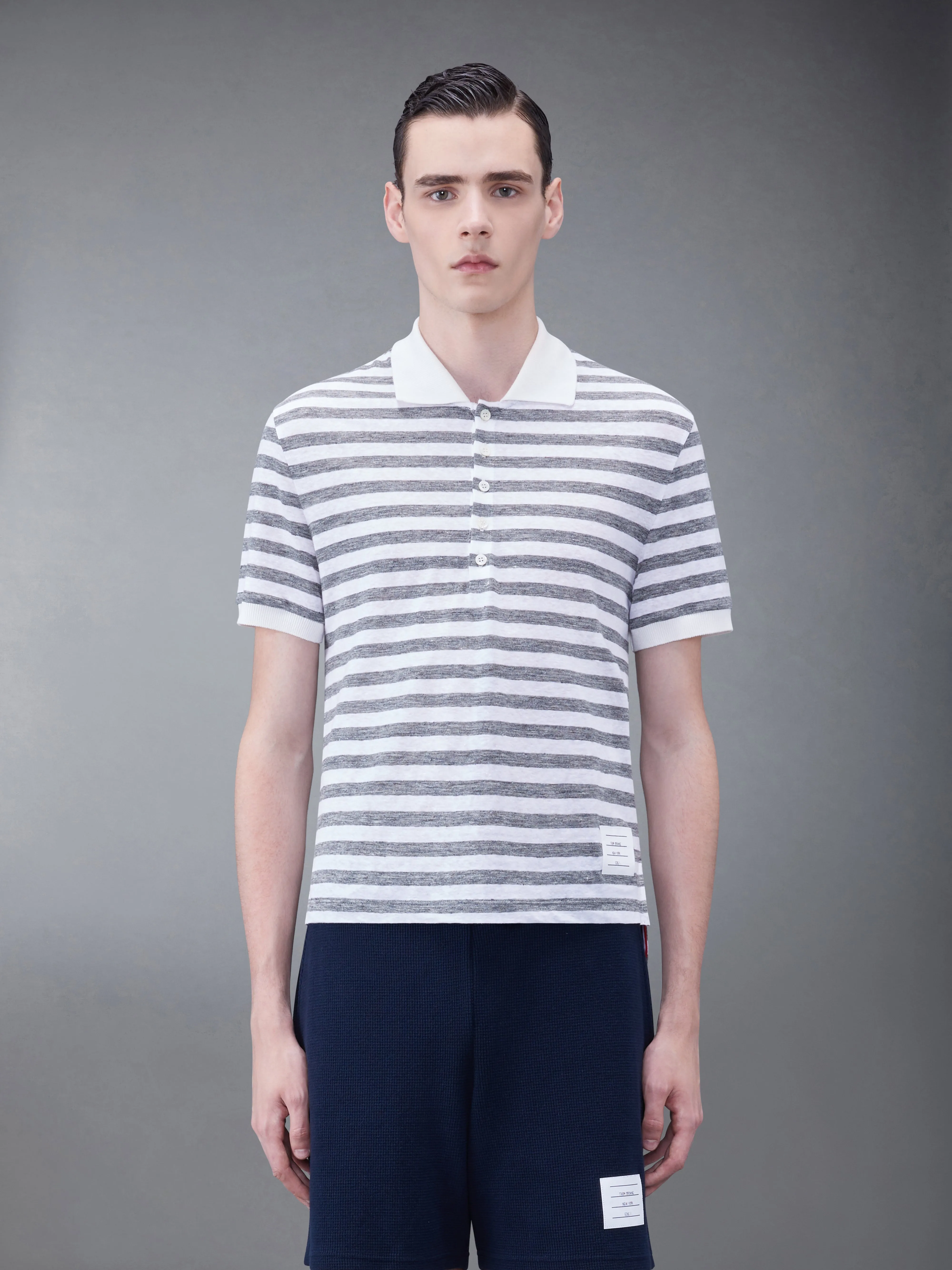 LINEN JERSEY SHORT SLEEVE STRIPED POLO sold by Thom Browne
