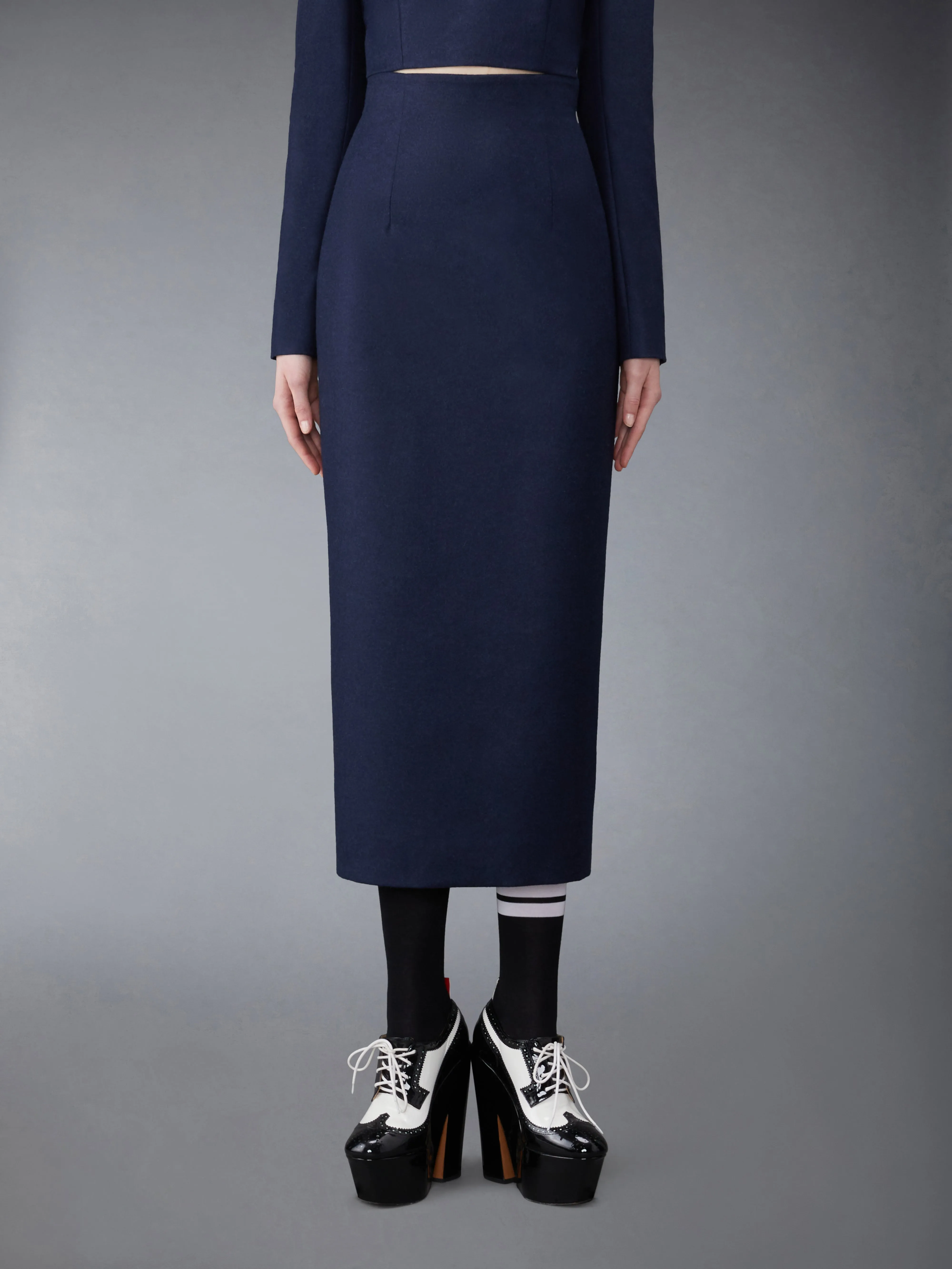 FLANNEL BUTTON BACK PENCIL SKIRT sold by Thom Browne