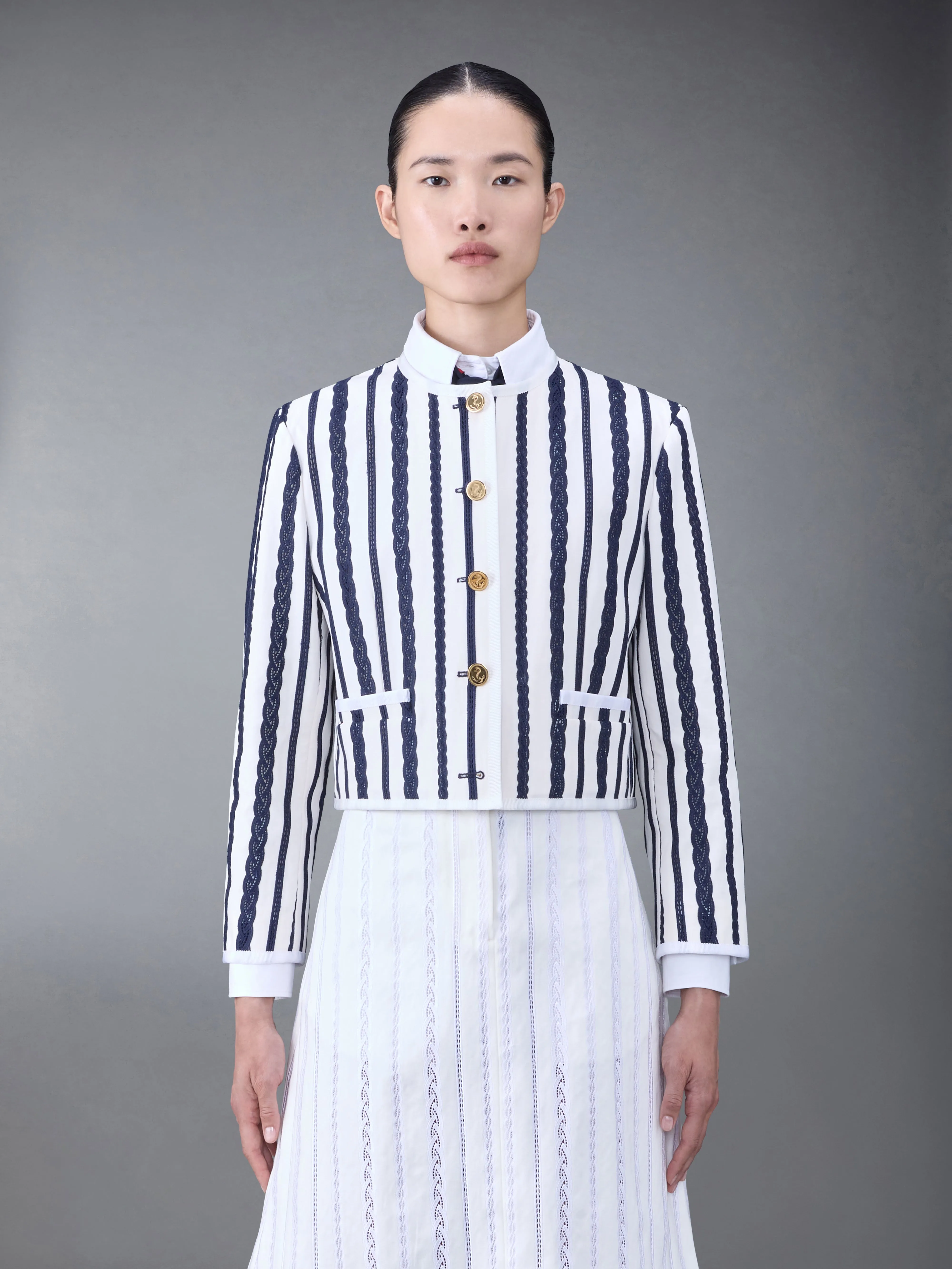 COTTON TWILL BOX PLEAT JACKET sold by Thom Browne