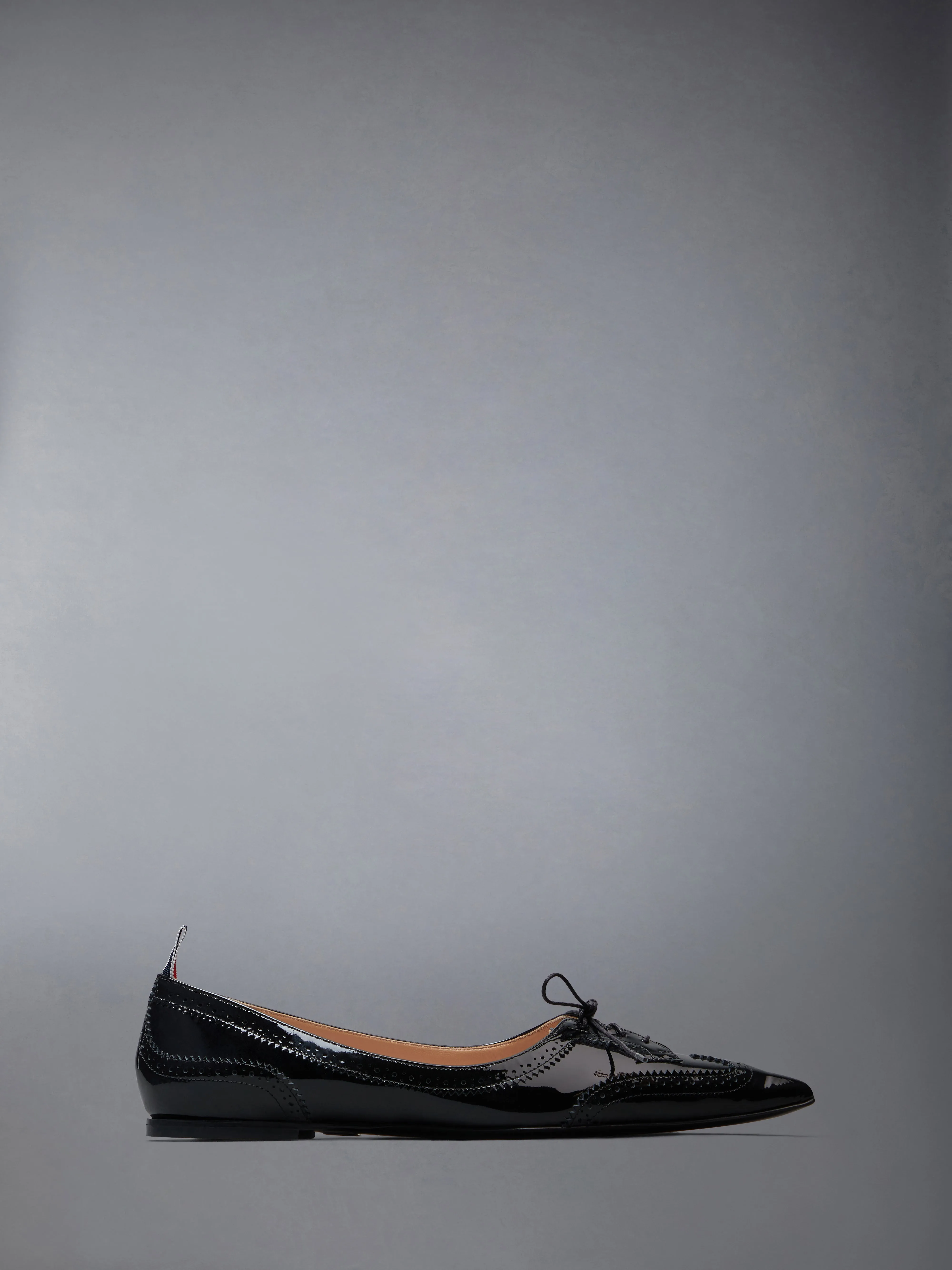 PATENT POINTED WINGTIP BALLERINA sold by Thom Browne