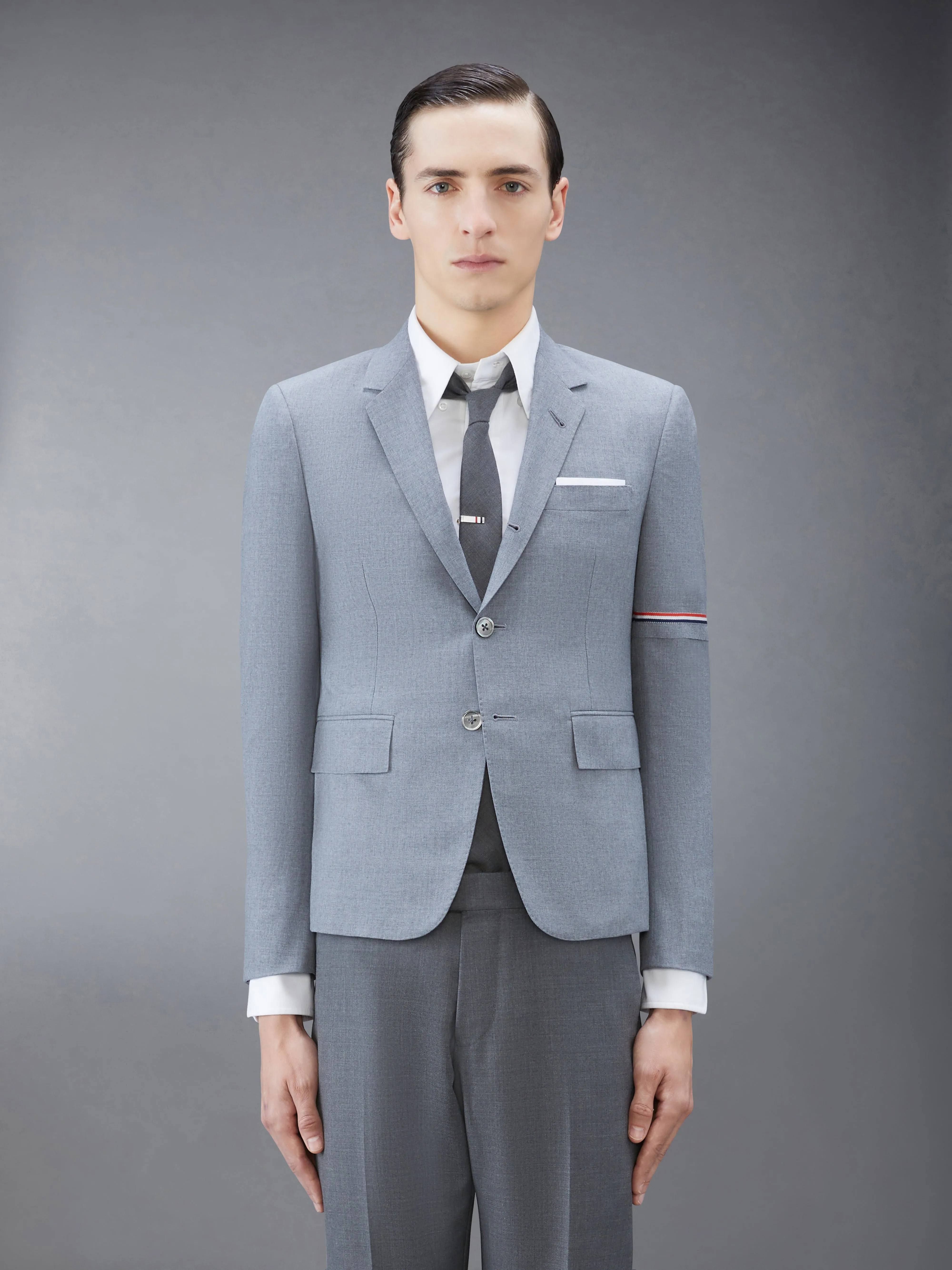 SCHOOL UNIFORM PLAIN WEAVE HIGH ARMHOLE SPORT COAT sold by Thom Browne