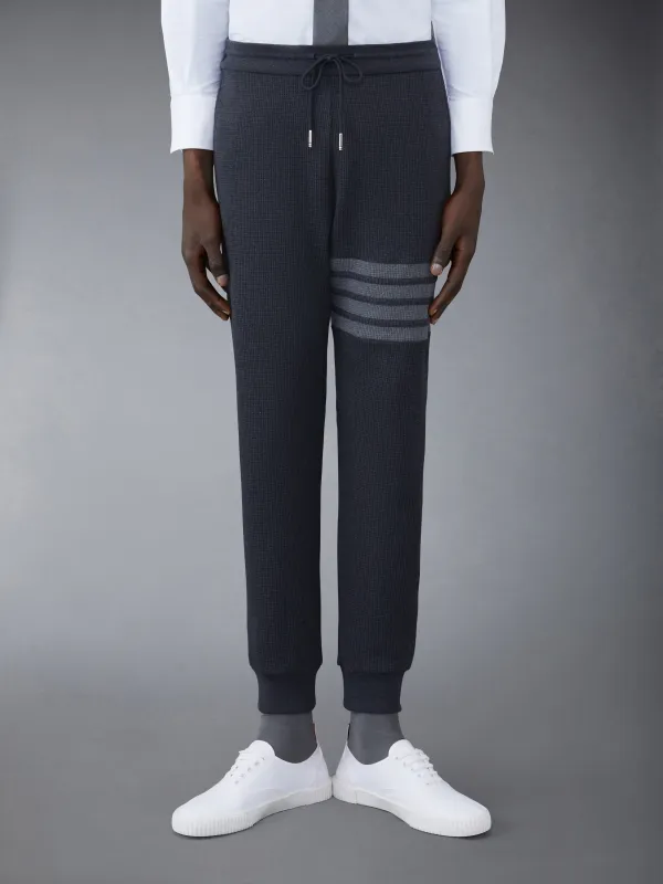 WAFFLE 4-BAR SWEATPANTS sold by Thom Browne